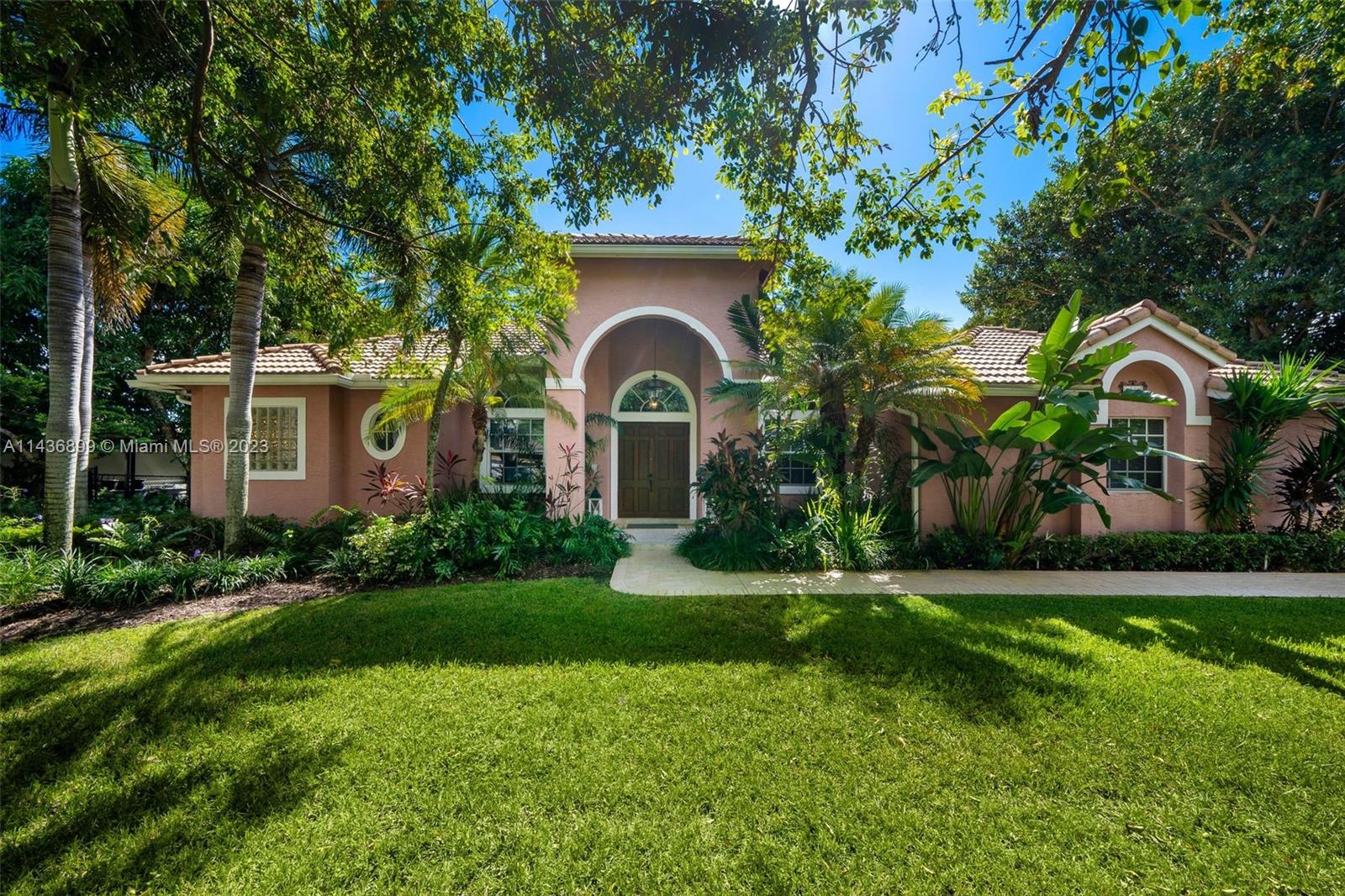 Canal front home in the gated community of Groves at Old Cutler. This 4 bed/3 bath home features a split floor plan with foyer entry, formal dining room, spacious living areas, open kitchen, master bath with soaking tub and separate shower, high ceilings, and 2-car garage. The tropical backyard features a covered terrace equipped with summer kitchen & built-in BBQ, overlooking the pool and waterway. Plenty of outdoor space to entertain or park a boat/RV.