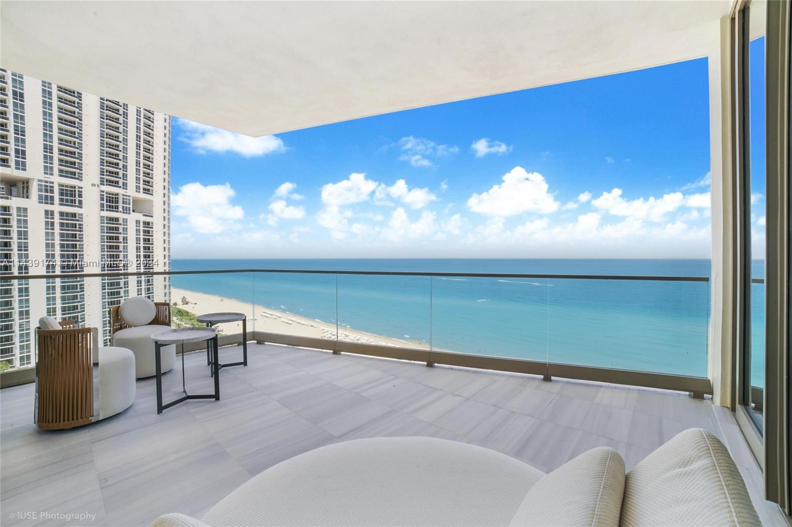Stunning brand new direct oceanfront corner 4 beds, 5.5 baths residence in one of the top developments in Miami The Boutique North Tower at the Estates at Acqualina. Turnkey fully finished and furnished residence has a full smart home automation system, custom closets, electric shades, beautiful wall papers throughout, fireplace, high-end Fendi furniture, gas La Cornue range, pizza oven, service quarter with it's bathroom, two terraces, summer kitchen and sauna. Five star, Five diamond Acqualina lifestyle offers exceptional service and amenities such as several restaurants including fine greek dining Avra, multiple pools, spa and fitness center, bowling alley, ice-skating rink, movie theater, Formula One, FlowRider surfing and Golf simulators, basketball court, soccer field and much more.
