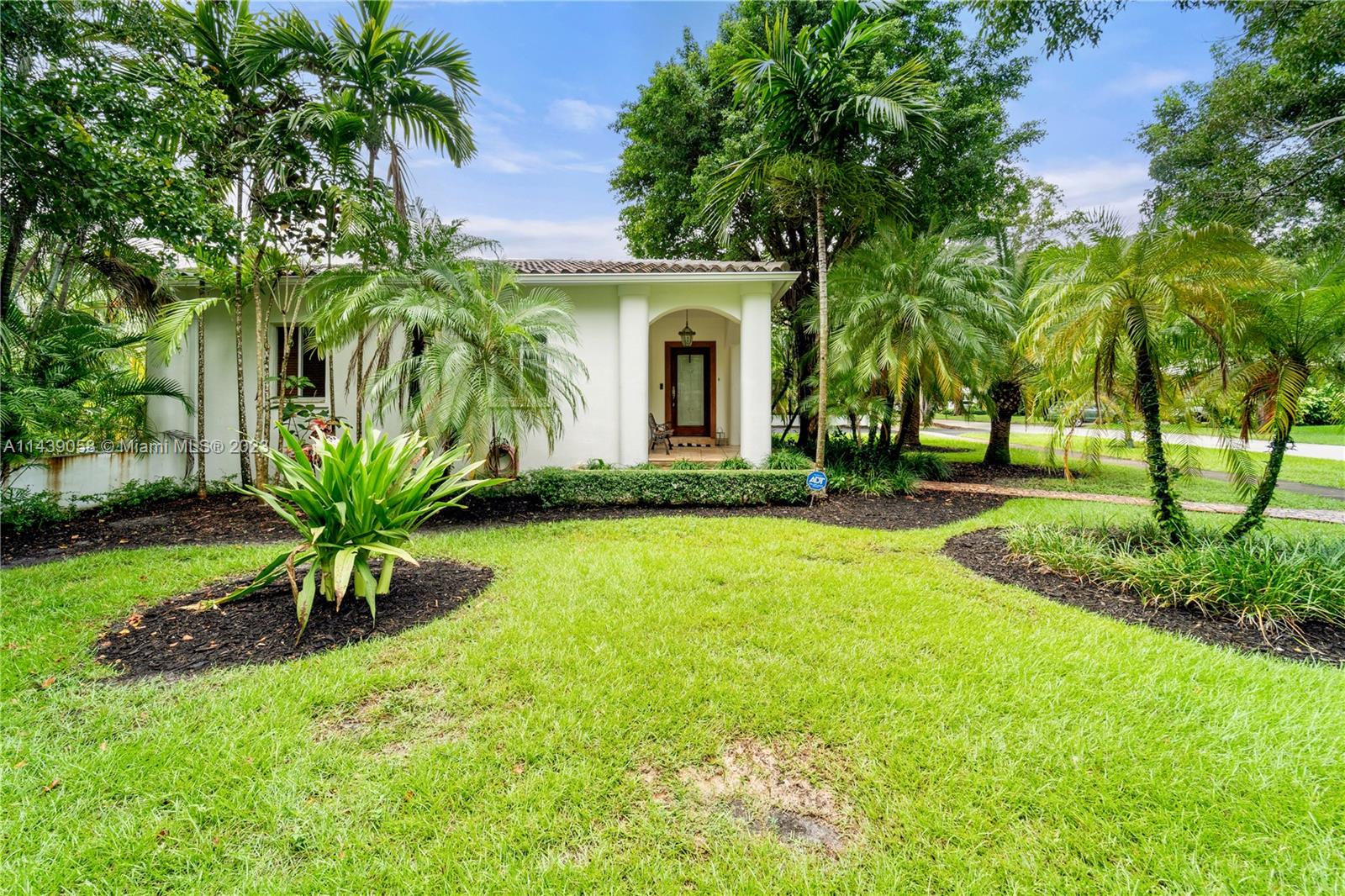 Exceptional opportunity in Coral Gables' revered Golden Triangle. This large corner lot boasts a sparkling pool and lush landscaping. The main house features hardwood floors, 3 bedrooms and 2 bathrooms, blending classic charm with modern comfort. Updated kitchen and baths provide a tasteful touch to daily living. Moreover, you'll find a gated carport, a detached 1-car garage and a bonus room with full bathroom. This space presents the perfect canvas for a home office, art studio or guest room. Nestled in a neighborhood known for its prestige, you're not just acquiring a home, but a lifestyle. Immerse yourself in the richness of the location, just steps away from the historic Biltmore Hotel and the Venetian Pool. Indulge in Coral Gables living, where sophistication and convenience converge.