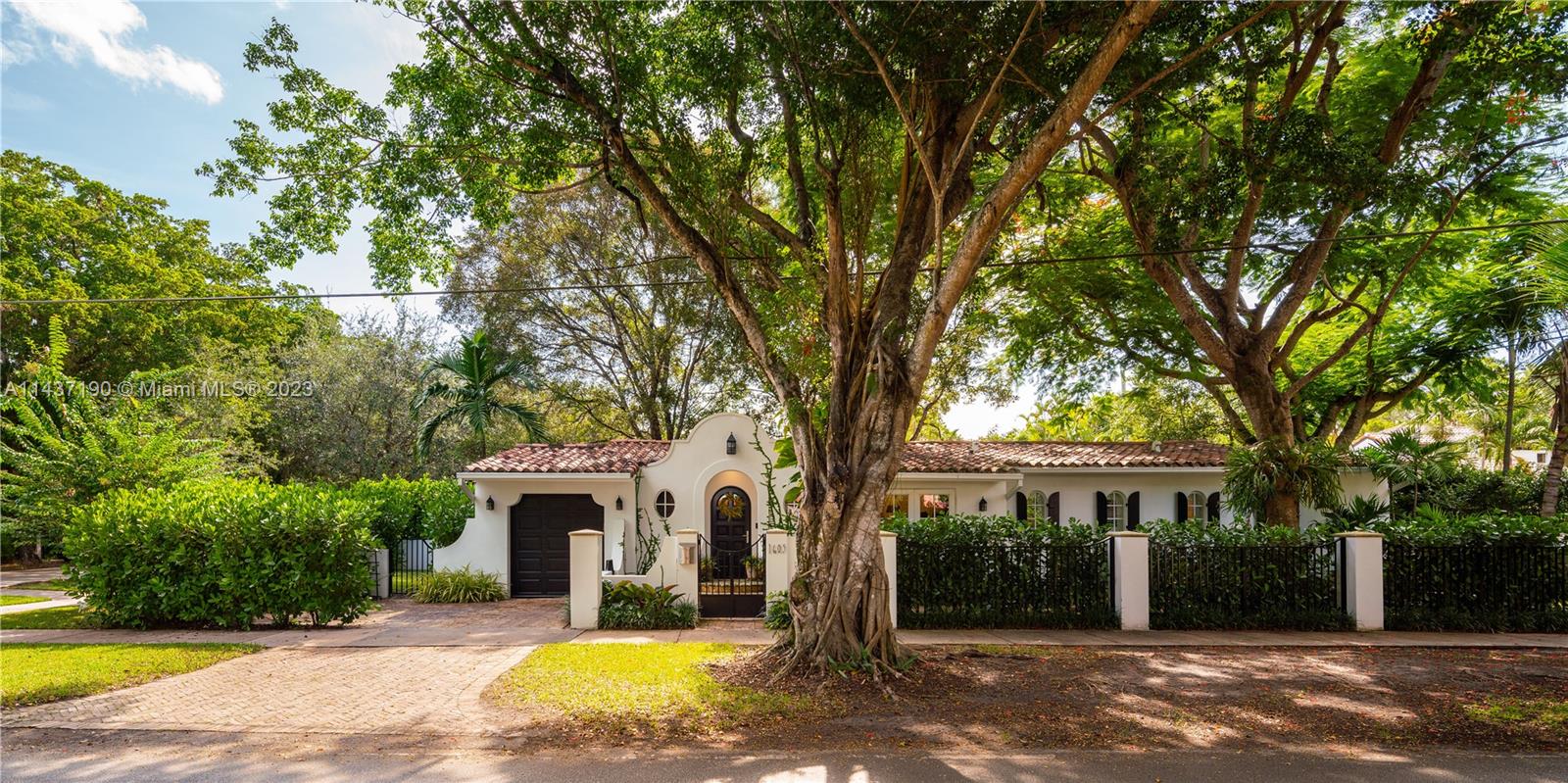 An enchanting fairytale home awaits its new chapter with a new homeowner. The allure of the corner courtyard entrance, moves you to peek inside & enjoy all the charm. From the limestone floors below, to the eye-catching exposed wood ceiling above, to the arched details, you are captivated. Fully remodeled, with PVC plumbing, impact doors & windows, updated electrical, beautiful kitchen, and spa-like bathrooms—all waiting for you to move right in! There are 2 spacious bedrooms plus a home office, and a garage. Built in BBQ area in patio for gatherings. There is even room for a small pool in the private yard! Blocks from the Granada Golf course. Sq footage larger than tax roll per seller. A true, Very Special Home.