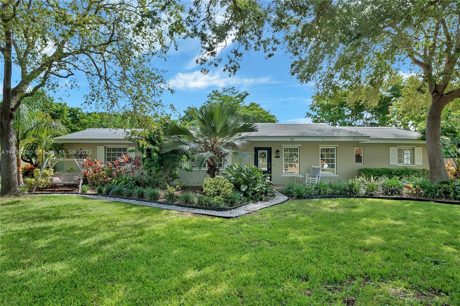 Delightful 4 bdrm/ 2 bath home on an oversized, corner lot in Palmetto Bay. Formal living and dining rooms. Upgraded galley style kitchen with quartz countertops, white cabinetry and stainless steel appliances connects to spacious family room with views of the swimming pool and expansive backyard. Wood flooring in living areas and neutral tile flooring in bedrooms. Separate primary suite with walk in closet, barn doors. 3 guest bedrooms located down the hall. Fenced yard with large covered terrace, free form pool, plenty of grassy space and room to park a boat.  Solar panels installed. Complete panel shutters. Generator ready. 2 car side entry garage.