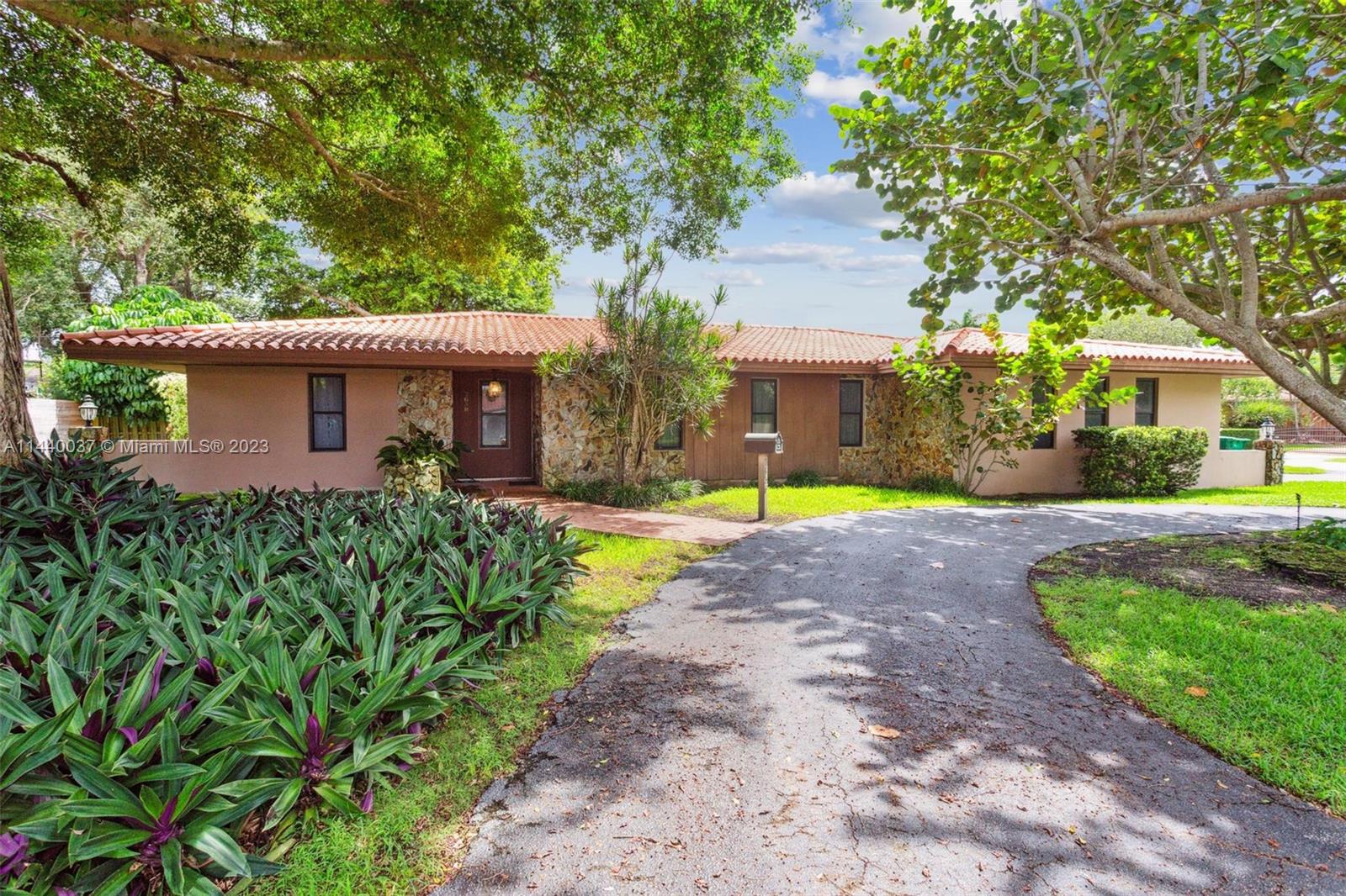 Old Cutler South wonderful neighborhood with fabulous quaint home of 4 bedrooms and 2 bathrooms. Perfect floor plan with lots of extra closet space. Formal living and dining rooms. Large kitchen with eat in breakfast area and opens to generous family room. Split plan with large master suite on one side and 3 other bedrooms on the other. Carpet and tile throughout. Barrel tile roof. Circular driveway and 2 car garage. Fenced back yard and refreshing pool and patio area.  Original owners kept it in great condition now ready for the next family to make it their own. Great possibilities in the best school district. Walking distance to Deering Estate, Thalatta, Library, bike path, great restaurants and shopping.