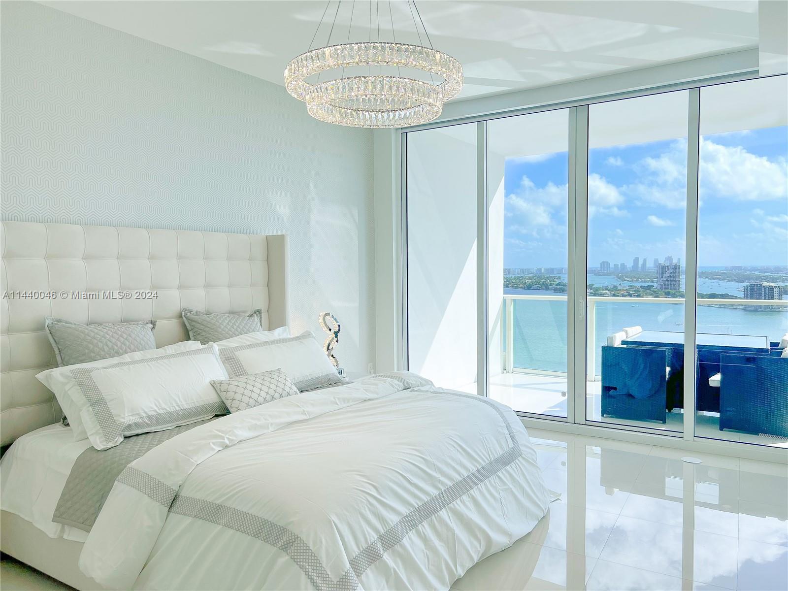 Ultra-luxurious fully-furnished 2BD/2BA at prestigious Paramount Bay. Residence features include private elevator, 10' ceilings, marble flooring throughout, floor-to-ceiling windows & sliders w/ automatic shades, LED crystal lighting fixtures, and more. The kitchen is home to imported Italian wood cabinetry and Wolf/Sub-Zero appliances. The primary suite features custom 3-D wallpaper, private water closet w/ bidet and walk-in closet, and a custom shower w/ one-of-a-kind switchable privacy glass (clear to frosted w/ the click of a button). Luxury amenities include valet parking, 24-hour front desk, 2 pools, 6,000 SF fitness center, business lounge, and more. Easy access to MIA, Brickell, SoBe, parks, and more. This is for the most discerning resident. Available for seasonal or annual lease.