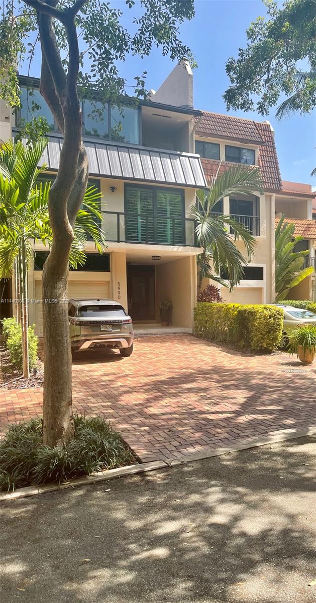 Paradise lifestyle in the exclusive, private island community of Royal Harbour Yacht Club. Spacious Tri-level Waterfront Unit, Completely Updated featuring 4 bedrooms, 3 baths, beautiful kitchen with stainless steel appliances, 1 car garage, Glass Railings of the 2nd floor bedrooms, metal roof and amazing views off every floor.  Entertain while watching the yachts go by in your backyard.  Community Amenities include a Private Beach/Chickee Hut, Sand Volleyball, Heated Pool/Spa, Tennis/Pickle Ball Courts, Club House, Nature Trail to Bay, Exercise Room and Private Marina. NO bridges to bay. Boat Dock Available for an Additional Fee. Easy to show and easy to Rent.