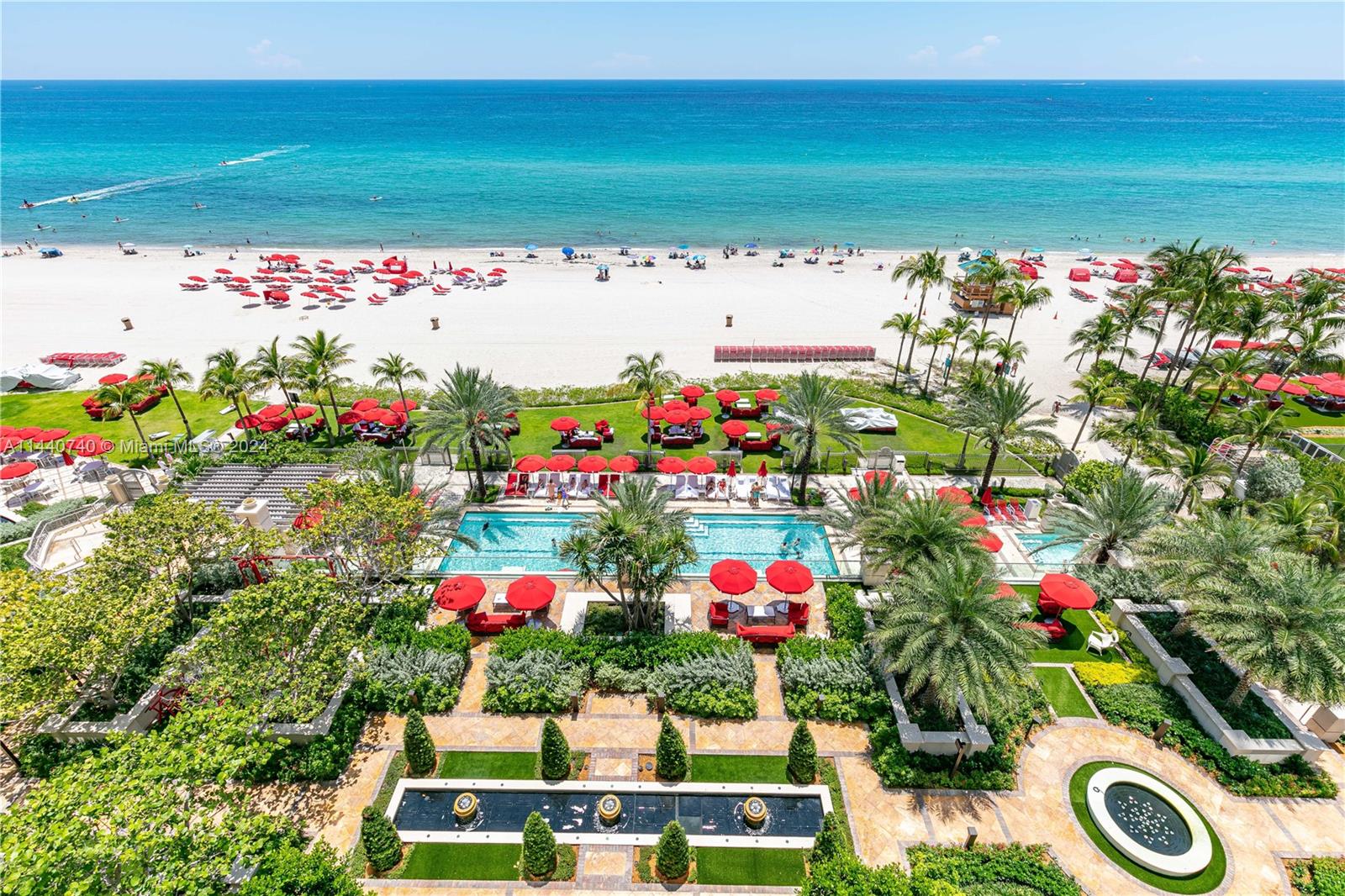Welcome to Miami's premier property, The Estates at Acqualina. Spectacular flow-through layout with 4 bedrooms plus family room, this plush residence features home automation, marble floors, luxurious wall coverings, onyx primary bathroom with steam shower, chef's kitchen with La Cornue gas range, three terraces complete with grill, and many other fine appointments. Luxury furniture from Casa Fendi may be included. World-class amenities featuring Rolls Royce house car, state-of-the-art spa and fitness facilities, daily breakfast, cinema, F1 and golf simulators, cigar lounge, bowling, skating rink, trading room, and tech lounge. Three pools complete with FlowRider and waterslide. Five restaurants on sight including Avra, Il Mulino and KeUh with pool and beach dining by Meze and Costa Grill.