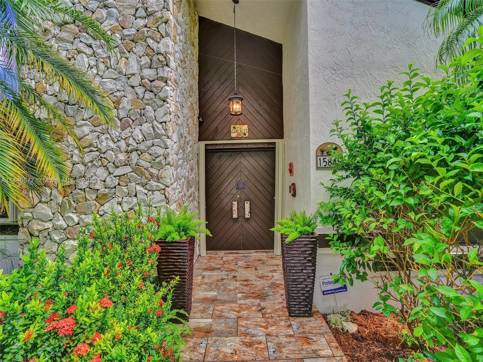 Nestled in the prestigious Redland area, this home spans over an acre, encapsulating a sense of peace and calm amidst a lush landscape. Framed by mature oak trees, its artful design showcases 3 bedrooms, 2 baths, and exquisite stonework. A vaulted ceiling adorns the spacious living and dining area with its inviting faux fireplace. Then enter a grand family room, ideal for large gatherings. The kitchen with granite countertops and stainless-steel appliances. A spacious master suite with a spa-inspired sanctuary en-suite bath, with orchid terrarium views and separate water closet. Outside, a manicured sanctuary reveals a covered patio and resort-style pool, set amidst fresh landscaping. 2017 roof and proximity to Redland favorites, experience tranquility in the heart of serene country living