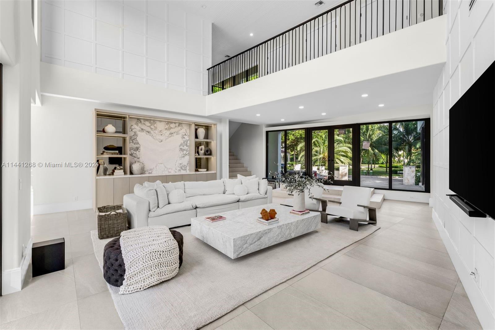 A rarity in Cocoplum: One of just 37 homes with direct ocean access without bridges.
This elegant residence effortlessly accommodates 100ft Yacht— an unmatched privilege for the yachting enthusiast. Designer renovated, this turn-key residence is tailored for hosting memorable gatherings with family and friends. Nestled in a prestigious enclave, residents enjoy unmatched privacy, police patrol, and club amenities as well as proximity to elite schools, fine boutiques and dining. Whether coming home from a day at sea or enjoying a game of tennis at the private courts, life in Cocoplum embodies unmatched luxury and exclusivity.