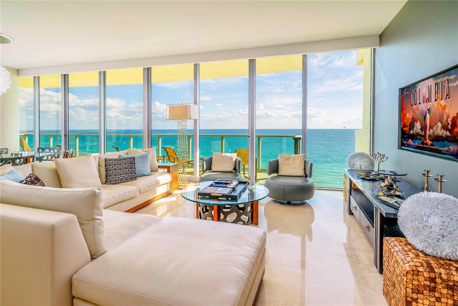 Panoramic views of Miami Beach and Atlantic Ocean are the centerpiece of this NE corner oceanfront lower Penthouse. This sanctuary of serenity features a spacious primary bedroom with a hallway of closets and two separate bathrooms, European kitchen with Subzero and Miele appliances and wraparound 10 ft. glass walls and terraces framing the ocean. The open plan creates an incredible flow of space and freedom while serving as the epicenter for hosting and entertaining. Designed by Luis Revuelta, Il Villaggio is an iconic luxury, Art Deco building situated on world-famous Ocean Drive. Il Villaggio remains at the forefront of luxury with five star amenities that include a new fitness center, concierge, 24/7 reception, valet and security, and more!