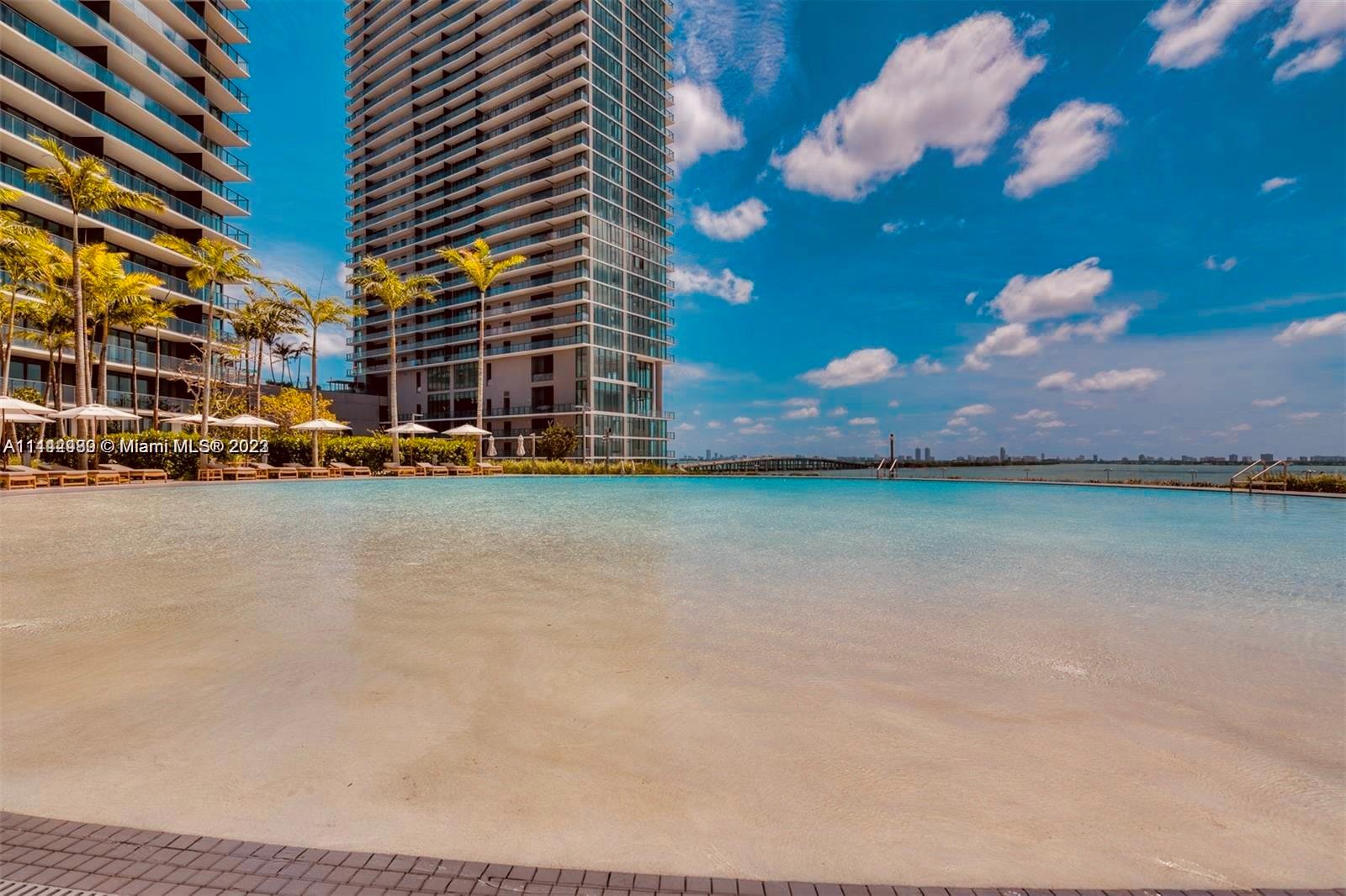 Amazing 4bed 4.5baths + Den, corner unit with private elevator entry. Open layout, top-of-the-line finishes, Italian Ceramic & tile floors, custom closets, and endless direct bay and Miami Beach views. Shades and blackouts throughout the unit. Enjoy the ultimate lifestyle with gorgeous amenities, including a resort-style pool, residents lounge, wine-tasting room, full-service gym/spa, children's playroom, tennis court, bowling, and much more. Excellent Location! 15 from Miami Beach, 8 min from Wynwood, Midtown, and Design District, and 15 mins from Miami airport. Unit is currently rented until 6/24 with a 90 days vacancy claus. Monthly rent $8,500.