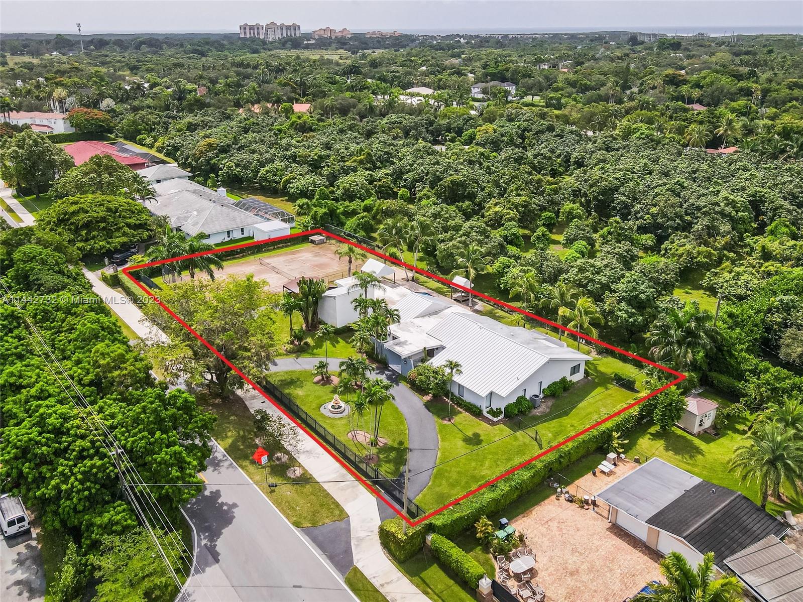 Step into a haven of comfort & luxury with this meticulously designed move-in-ready, single-story pool home. Boasting an impressive layout of 5 beds, 4 baths,& a 2-car garage, The centerpiece of the home is the chef's kitchen, enhanced by dual islands that flawlessly combine functionality & style. Sunlight gracefully streams through, illuminating the interiors & creating an atmosphere that beckons you to unwind. From poolside gatherings to tennis & pickleball matches on the Red Clay Court, this home calls for leisure & fun. Discover tranquility on the covered terrace, embraced by the lush yard—a serene retreat. Benefit from the convenience of top schools, & dining options nearby. The 1-bed/1-bath guest quarters, with private poolside & side entry, cater to guests, in-laws, or office needs.