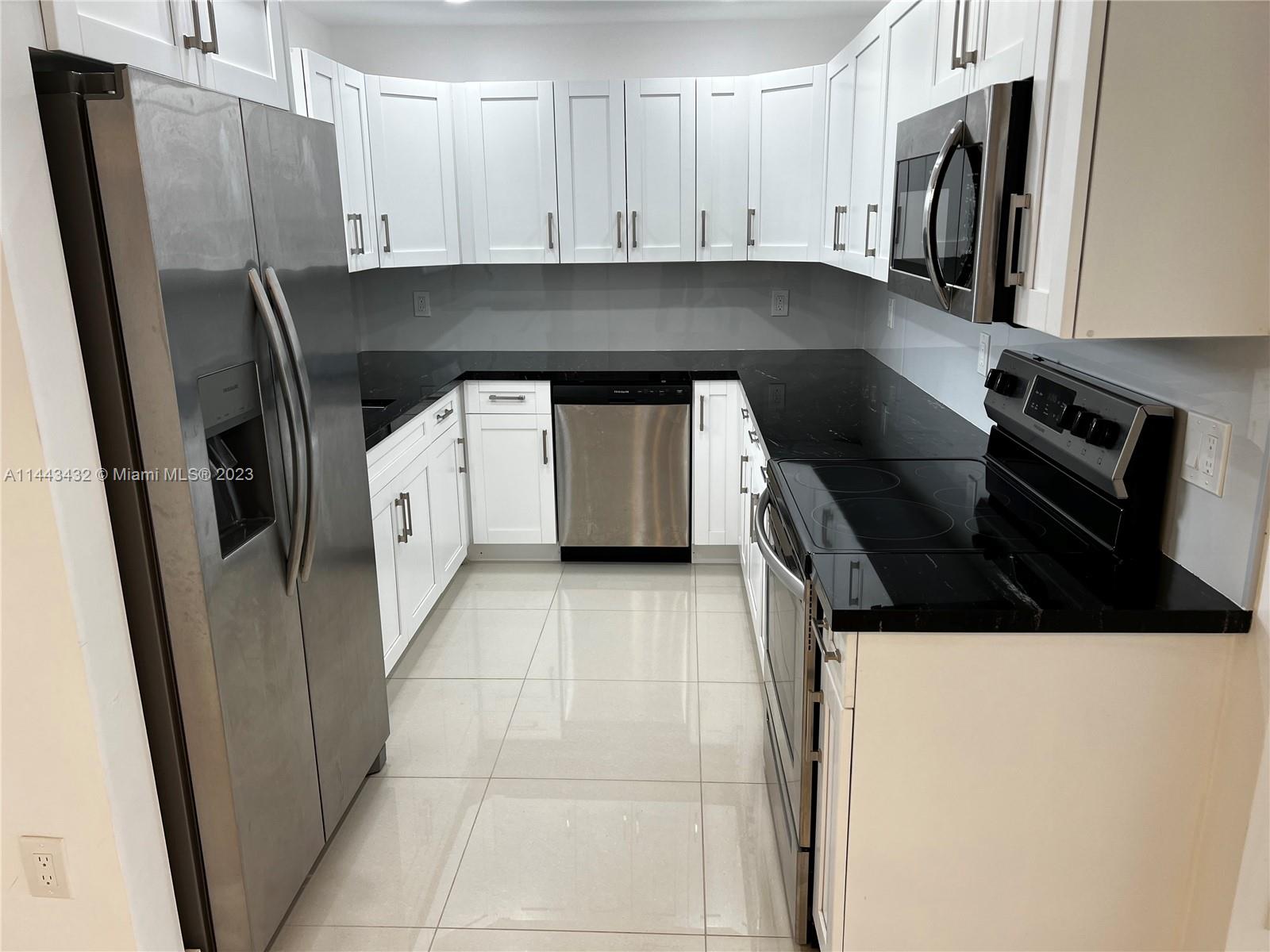 Beautifull, completely renovated unit with no expense spared. Enjoy all Gardens Of Kendall amentities including security, swimming pool, tennis courts, clubhouse & more.  Landlord requires 2 month security plus 1st month rent & good credit.