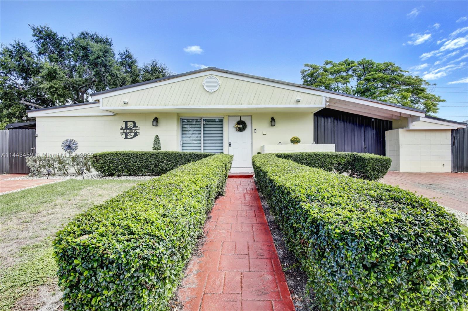 NO HOA! ROOM FOR A POOL! 2 IN-LAWS WITH SEPARATE ENTRANCE! IMPACT WINDOWS. Side yard space to fit a boat/RV (with RV hook-ups ready) UPDATED Single-Family home features tile flooring throughout the main area. Wood laminate in bedrooms. Updated kitchen with quartz countertops, stainless steel appliances, and a cooking island. Gas stove. Master bedroom with barn door leading to master bathroom en-suite. The backyard features a covered patio with ceiling fans perfect for entertaining.