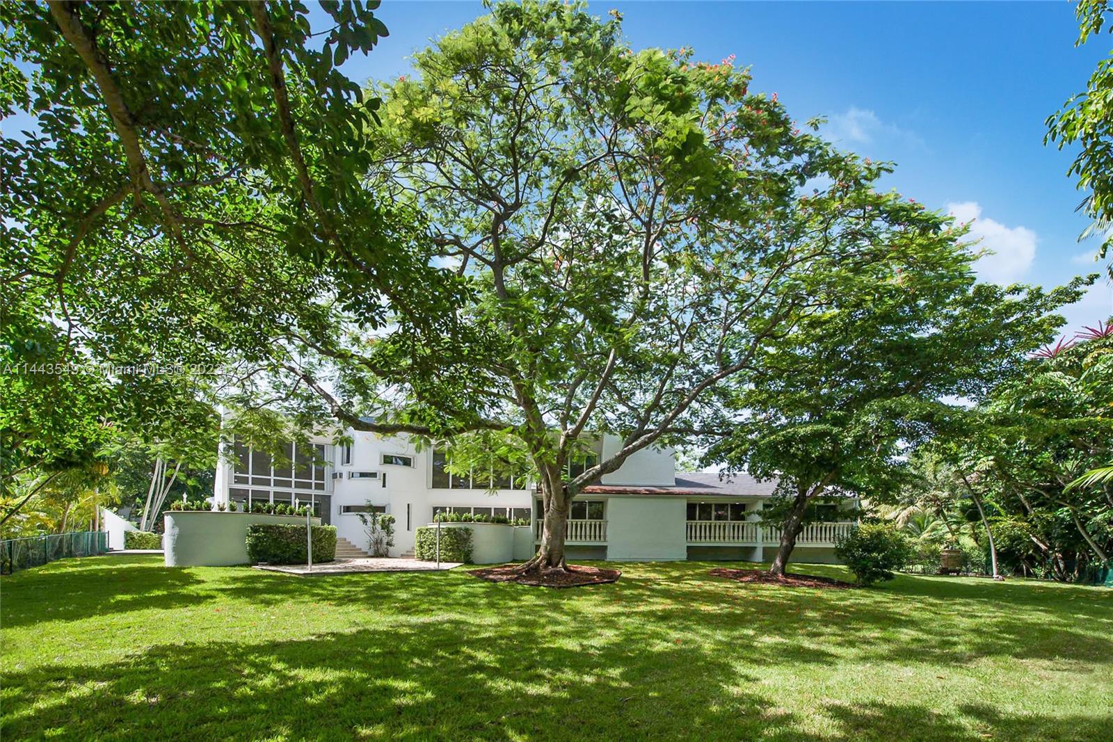 Opportunity! This 2 story, 5 bed, 4 / 1 bath is perfectly located in the Exclusive & Gated Community of Cocoplum. Spacious, natural light filled and nestled on an oversized lot, this home is nestled on an oversized half acre + lot and steps away from the tennis courts. A must see! Also available for sale.