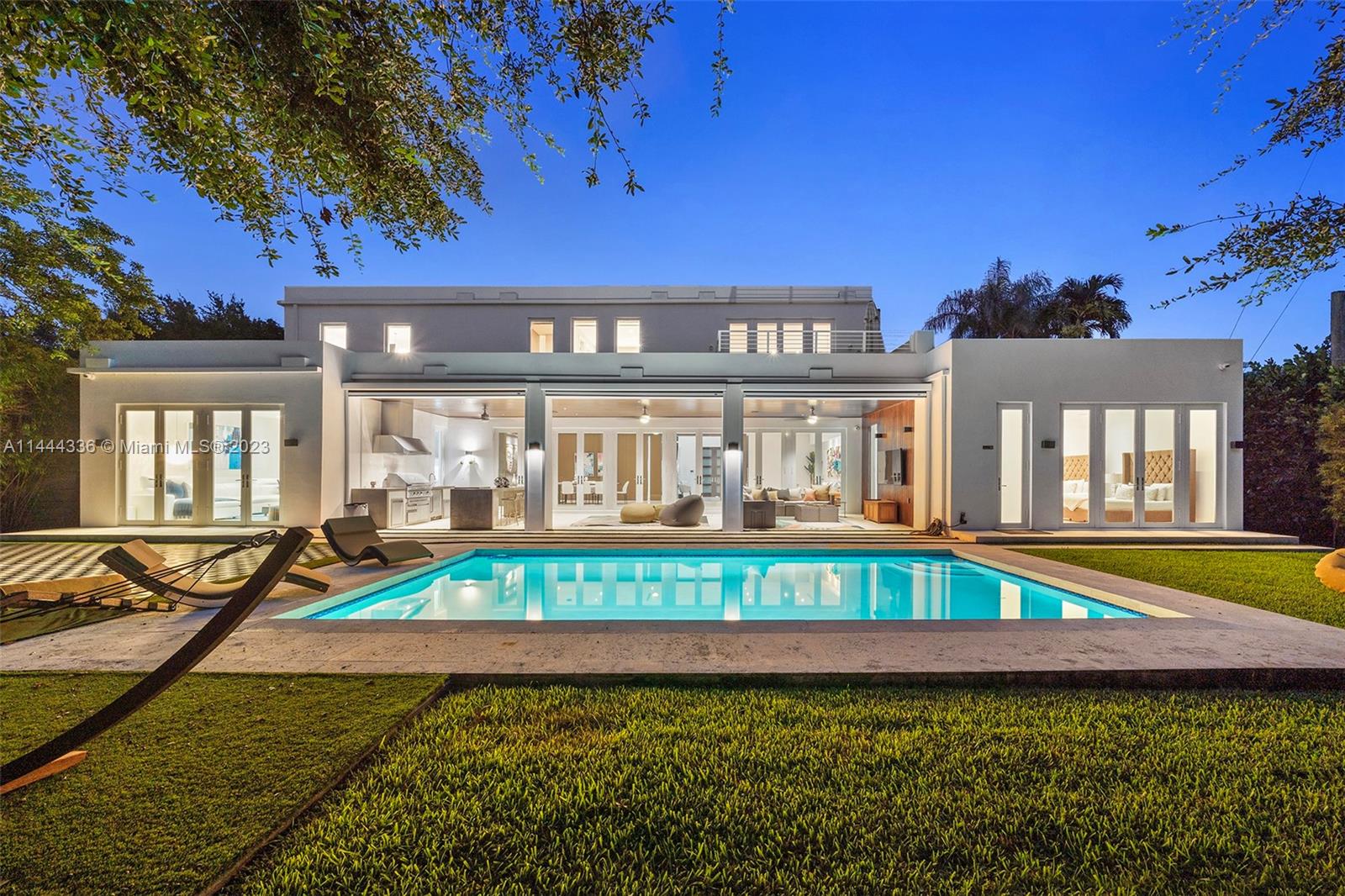 Absolutely Gorgeous modern home, centrally located and minutes to the Grove, Gables and Downtown. Huge backyard for kids and entertaining, high ceilings media room, Sonos system thru-out, 1/2 basketball court, equipped gym, giant family room and plenty of parking. Call listing agent for appt/exclusive showings