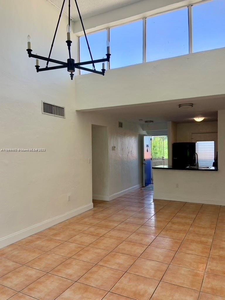 Bright, updated 2 bedroom 2 bath corner top unit located in the heart of Coral Gables. This open floor plan unit offer NEW IMPACT WINDOWS, cathedral ceilings, ceramic tile and laminate wood floors throughout. Covered parking, updated kitchen, master bedroom on suite , walk in closets and much more.