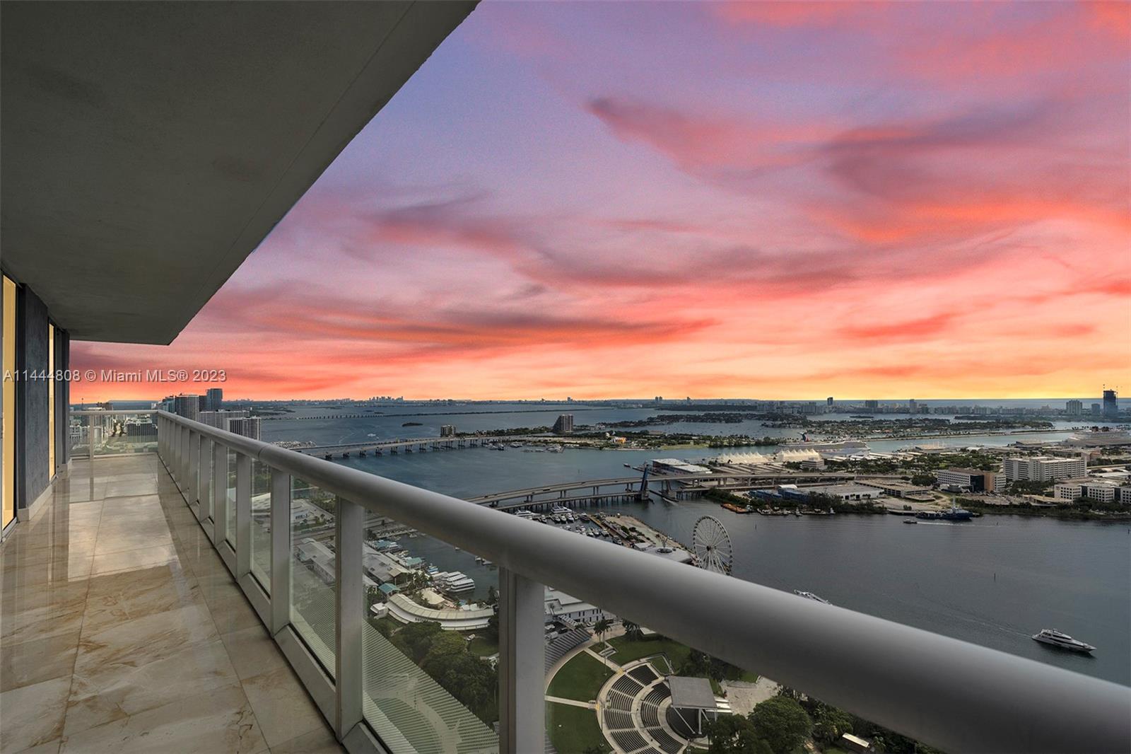 Fantastic 3/2 on a high floor!!  Beautiful corner unit with wrap around balcony and expansive views of bay, ocean, South Beach, and skyline. Unique opportunity to combine with 5201. This unit offers 1789 sq ft with plenty of room for comfortable living. Marble floors add luxury and elegance to the interior. Includes one parking space. Close to Kaseya Arena, Arscht Center, Whole Foods, and Brickell City Centre.  Easy access to Metromover, I95 and South Beach. Incredible amenities include spa, pool, gyms and social areas.  Amazing opportunity to combine with 5201 for over 3,000 sq ft of luxury. This condo/building offers modern conveniences, stunning views, and central location, making it a highly desirable place to live and enjoy the vibrant urban lifestyle of Downtown Miami.  WILL NOT LAST