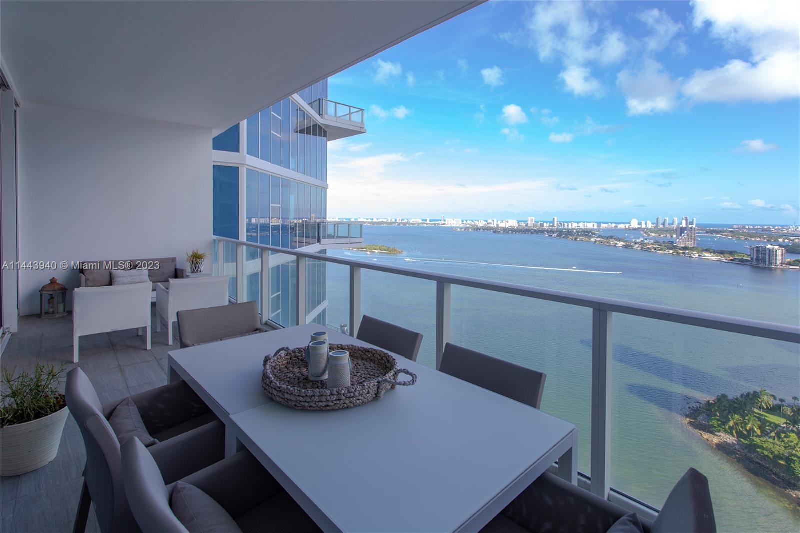 Stunning high end furnished unit overlooking the bay and the ocean with a 10 foot deep balcony! Private Elevator, private foyer, spacious 3 bedrooms and 3 bathrooms, open kitchen with large island, floor to ceiling high impact windows, custom electric blinds throughout the unit, walk in closet, top of the line appliances. Additional features include 10 ft ceiling through out and separate laundry room. The Paramount Bay is designed by Arquitectonica and Lenny Kravitz, is one of the most stylish and upscale buildings in Miami with 5 star amenities such as Sunrise and Sunset pool, two story health and wellness facility with professionally staff, kids room and teens rooms, party room with chef's kitchen and catering kitchen, meeting room and library.