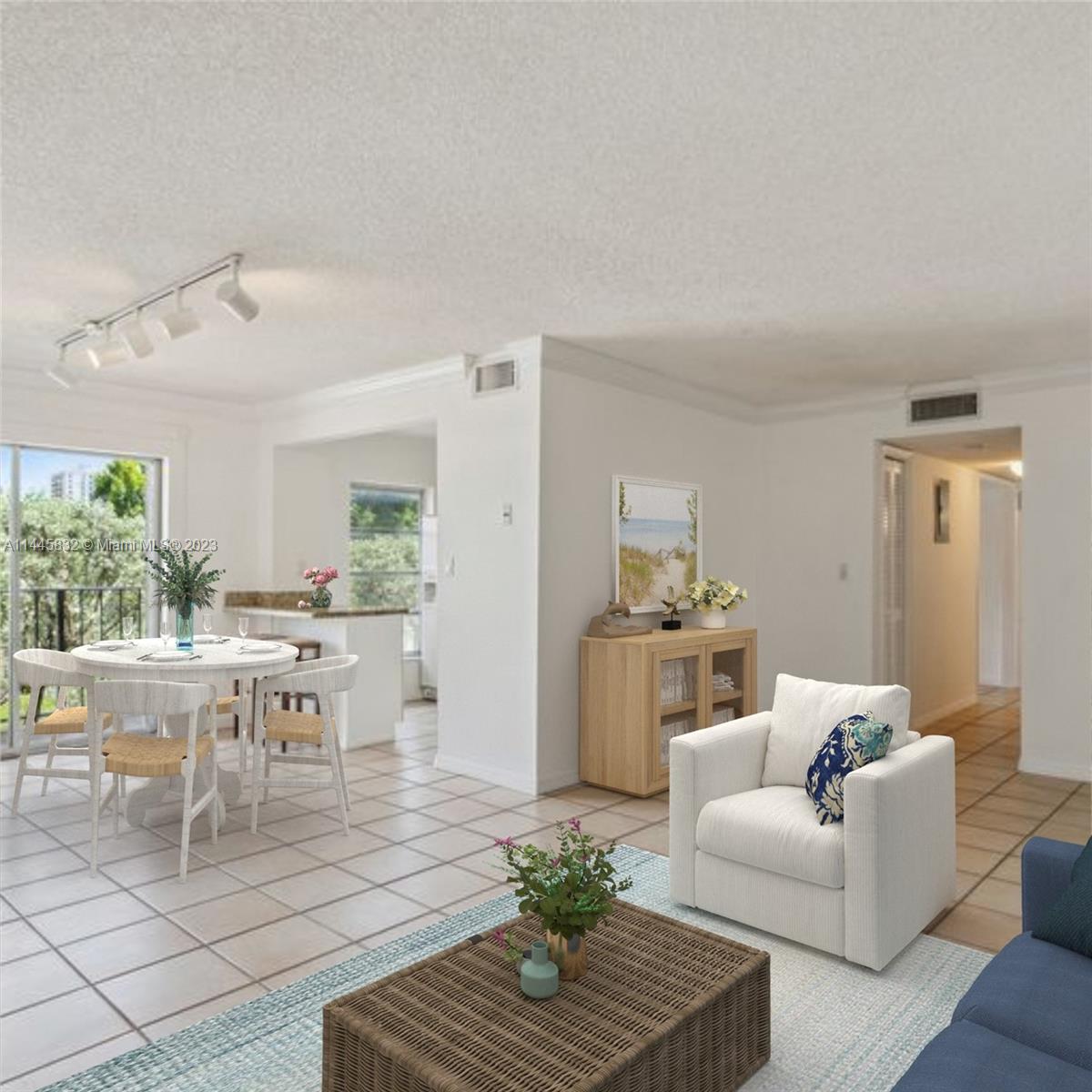 Best priced 2/2 condo in Coral Gables!  Boutique 22 unit in Ionian Plaza is centrally located in the city beautiful.  Block away from Ponce de Leon with free trolley service and Phillips Park w/ tennis courts and playground - directly behind conveniently located Publix makes this an ideal urban walkable place to call home!  Spacious and updated - with remodeled kitchen and baths, tiled throughout, New central A/C, stackable washer/dryer, 1 covered parking space plus guest parking, wonderful pool plus each unit comes with a separate storage space.  Low maintenance $610/mo, intercom entry to building. No Special assessments and bldg has general reserves. The 40 + 10 year re-certification has been completed.  Building has a new roof and newer elevator. Easy to show, vacant.