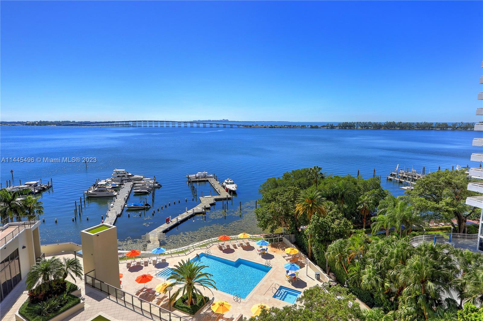 Villa Regina at its best! This 4,126 square-foot residence in the sky offers breathtaking city, ocean and Biscayne Bay views. Units 503-504 have been combined to create a perfectly distributed open floor plan maximizing living areas and views from floor to ceiling windows. Updated to perfection, it features a master suite w/sitting area, dual bathrooms and two extra large walk-in-closets. Two additional bedrooms with 2/baths. Powder room, office, den area, spacious laundry room. Great size kitchen w/ top of the line appliances & breakfast nook. The two original entrances were preserved to give flexibility to the floor plan & access to the elevators. Unit comes with 3 assigned parking spaces. Amenities include a marina, party rooms, pool, barbecues, gym, 24 hours concierge and more.
