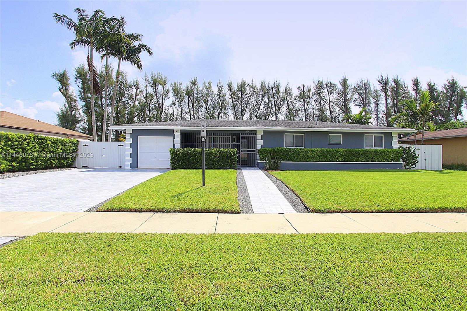IMPACT WINDOWS! NO HOA! Single-family home with a POOL! Features an UPDATED kitchen with granite countertops, stainless steel appliances, and plenty of cabinetry space. Large windows for plenty of natural light throughout the home. The garage was converted to the 4th bedroom (currently used as storage) with private access to the exterior and AC wall unit. Master bedroom with master bathroom ensuite with access to the pool. Spacious laundry room. Large backyard recently updated patio flooring. Mature fence trees for added privacy!