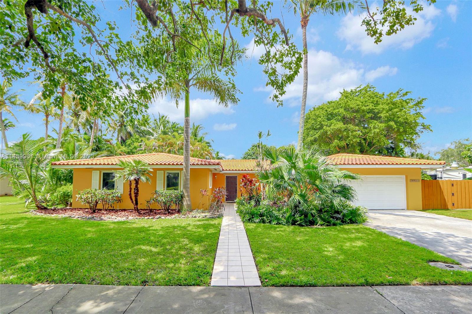 Spacious Palmetto Bay home nestled in a lovely, tree shaded and peaceful neighborhood, located on the no-through north side of 87 Avenue. This home is upgraded with IMPACT WINDOWS AND DOORS. BARREL TILE ROOF 2015. As you step inside, you are welcomed by the view of the pool. The kitchen area is oversized, allowing ample space for your own design plan. Nice family friendly layout with generously proportioned bedrooms. Enjoyable outdoor space with covered patio, freeform pool, and relaxing spa. The side yard offers the perfect space for a boat. Exceptional school district. A fabulous location to invest your family’s future in. Furniture is virtual.
