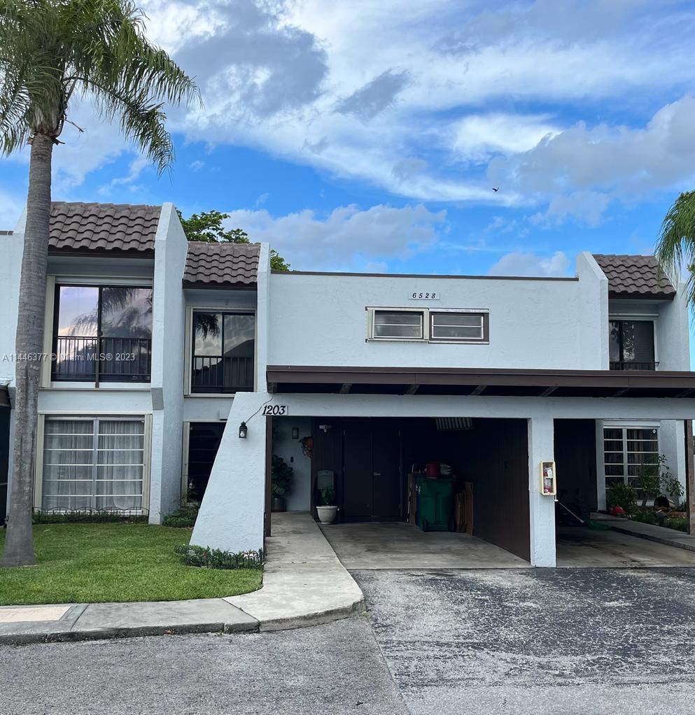 Well maintained 2 story 2/2.5 bath townhome in Kendale Lakes, across the street from Miccosukee golf course. 2 private parking spaces, tile & wood floors, spacious floor plan with enclosed terrace and private yard. SS appliances, both bedrooms have private baths, Master bedroom has balcony which overlooks the golf course. 1/2 bath and laundry on first floor, accordion shutters. Community has pool and is close to major roads, shopping, bike paths and nearby park
