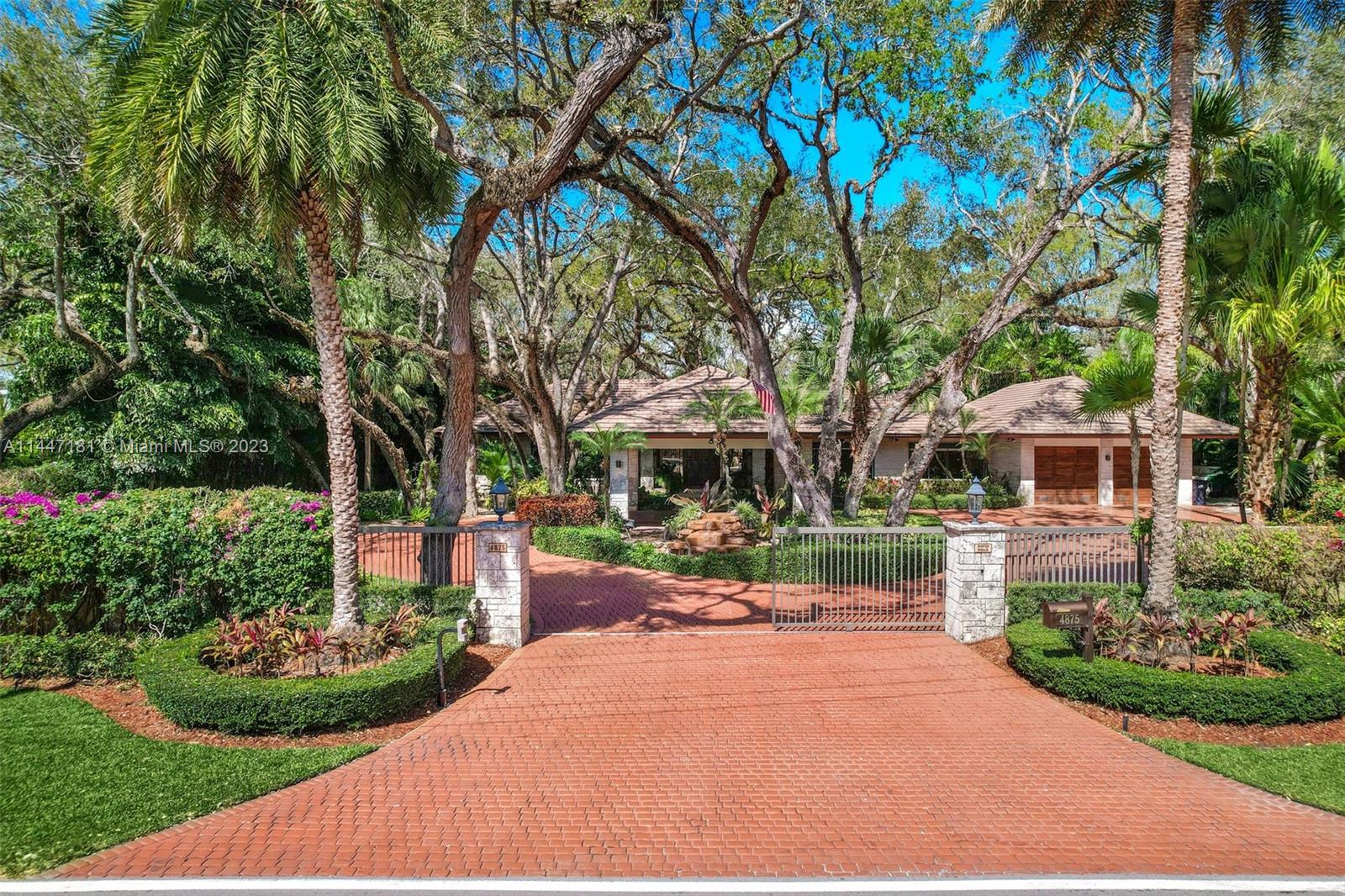 Located in the heart of the sought-after Ponce Davis neighborhood, this amazing one-story Florida home sits on 1 acre of land surrounded by lush landscaping and majestic live oak trees with tons of privacy. This magnificent and spacious residence offers warmth, style, elegance, and comfort with a great floor plan and beautiful vaulted mahogany ceilings throughout. The home provides a defined formal living, dining, kitchen, and family room that overlooks a gorgeous oversized pool, cabana with bathroom, patio area, and tennis court. Additionally, five spacious bedrooms with en-suites, powder room, 2 car garage and gated entrance make this home a true gem. From the moment you enter, there is a seamless flow from the exterior to the interior with a vibrant and one-of-a-kind energy.