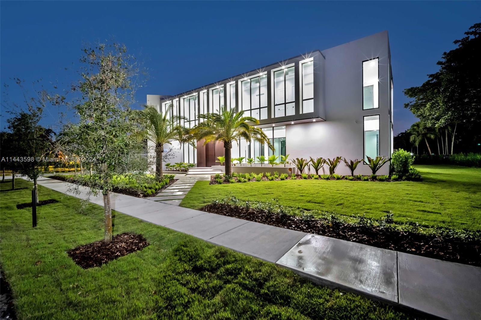 Introducing a Pinecrest Village luxurious masterpiece - a modern smart home with unique architecture. Each bedroom boasts ensuites, built-ins and private terraces. Notable features include a 20-ft ceiling foyer, unique pivot entry door, LED-lit staircase, and top-tier security system. The chef's kitchen dazzles with integrated Miele appliances, quartz counters, and a built-in pantry. A service room with bathroom and private entry, a master suite with spa-like bath and sitting area, and outdoor delights like a lap pool, jacuzzi, and summer kitchen await and so much more. This luxurious masterpiece is your gateway to opulent living.