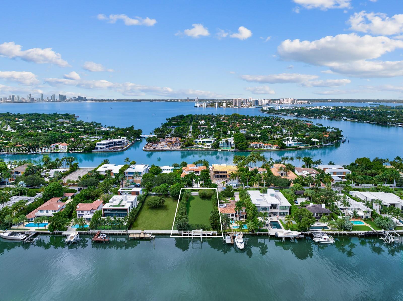 This exceptional property on Allison Island in Miami Beach presents a unique opportunity to build your dream home in one of the city's most exclusive gated communities. With breathtaking water views and stunning sunrises as your daily backdrop, this is a setting like no other. Included in this offering are fully permitted architectural plans by renowned architect Cesar Molina. These plans are designed for a modern tropical masterpiece boasting 7 bedrooms and 7 bathrooms, spread across 8,000 square feet of luxurious interior space. With a generous 16,200-square-foot lot, this property boasts an impressive 75 feet of water frontage along with a brand-new seawall, dock and lift . You'll have direct access to the water, making it perfect for water enthusiasts and boaters..
