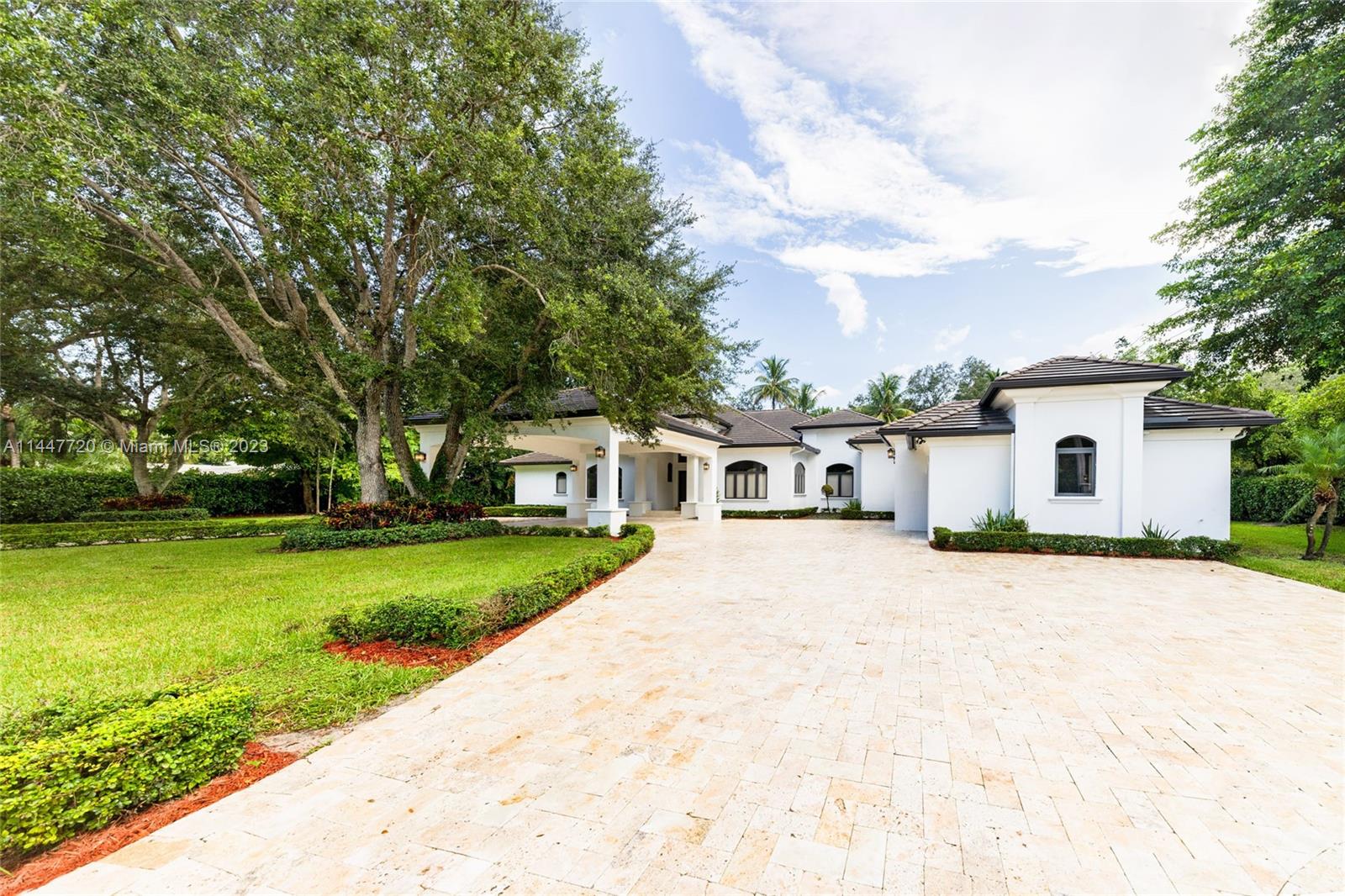 Stunning, completely remodeled 5BD/5.5BR entertainer's dream. One story luxury in the heart of Pinecrest! Stately driveway, hurricane windows, landscaping, & modern exterior paint are just a few of the WOW factors as you pull up. Inside the voluminous open floor plan allows for a space everyone can enjoy with abundant natural light. Chef inspired gourmet kitchen with upgraded modern cabinets, new built-in appliances & center island. This 7,971 Sqft home on a 40,949 Sqft Lot includes custom tilework throughout, plenty of storage & marble counters, spacious bedrooms & luxury bathrooms that inspire spa baths & long showers. Outside, the backyard is an oasis with sprawling patio, private in-ground pool, spa, and lots of space for kids and pets. Tour & Fall in Love!!