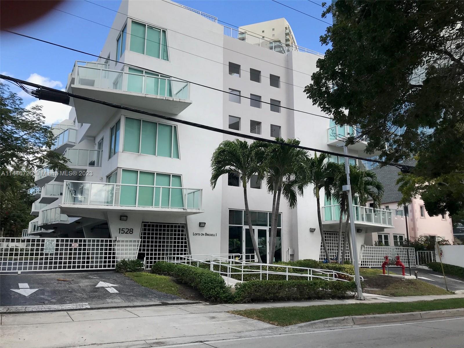 Rarely seen opportunity to own a 1 Bed 1 1/2 Bath 2 story Loft unit on Brickell Ave with 2 Balconies. Recently renovated unit on top floor, on South side of building with a great view. Renovated items Include AC, Ceramic floors, Instant hot water heaters, Exhaust fans in bathrooms, New Window Shades with Black-Out Blinds, Light fixtures, & newly painted. 1 Assigned Covered Parking Space #7. Washer & Dryer in unit. Fully equipped Kitchen with Italian cabinetry, stove top with Hood exhaust & lit, Full sized Oven, Fridge/Freezer w/Water & Ice, Dishwasher, Microwave & Garbage Disposal. All windows & Doors are Impact resistant. Storage space under stairs & Recessed Book Case in Living room. Building has Secure Parking lot & Elevators as well as Secured  Building Stairs.
