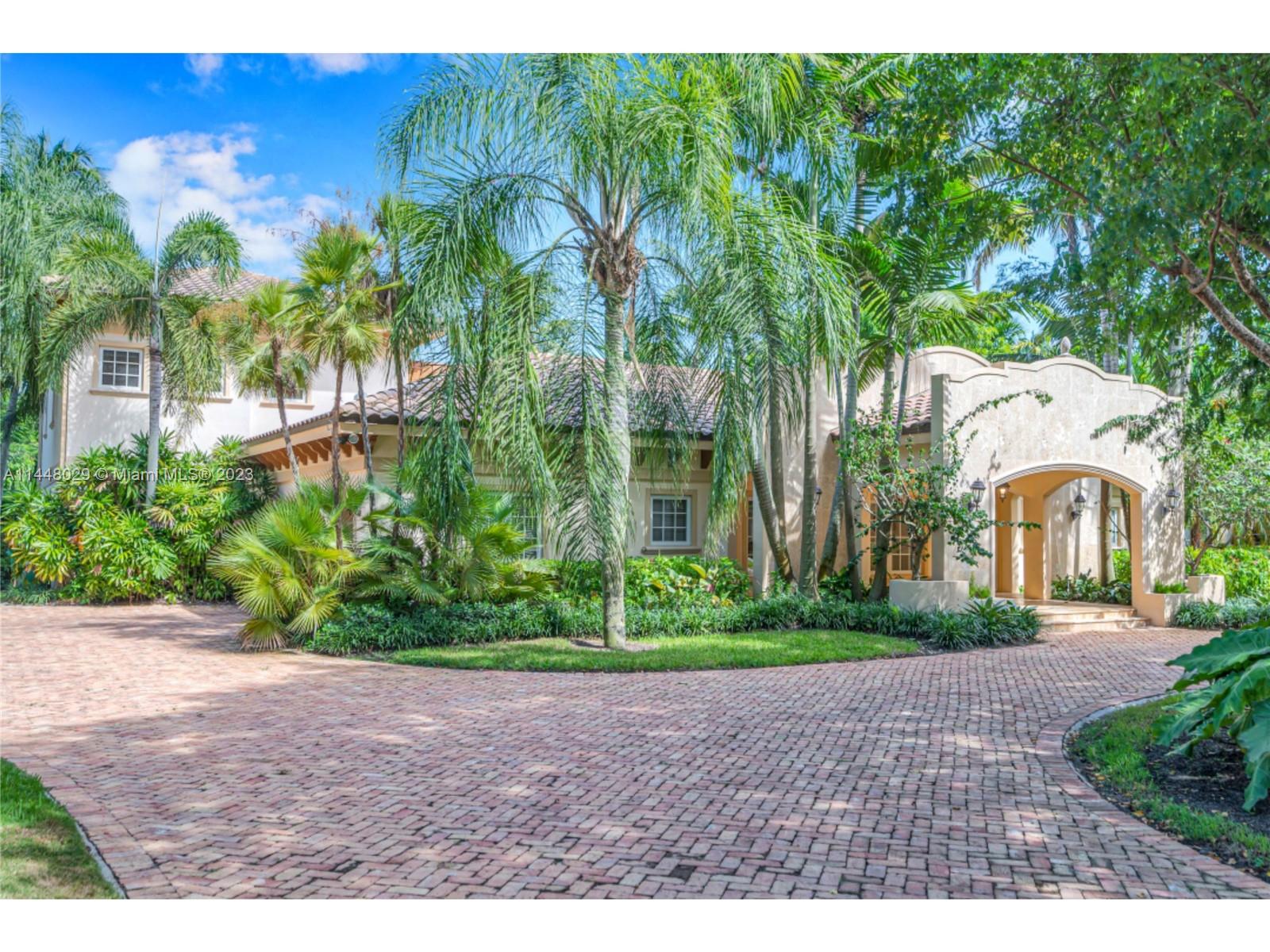PRIVACY-LUXURY-SECURITY Escape to your Lushly Landscaped 2-Story Resort Villa, in Prime North Pinecrest. This split plan (2-3) 5BR - 5BA, fully gated, corner lot home, is close to all the great schools, shopping & the highway. Thoroughly Remodeled 2020, & Built in 2011 W upgrades to the highest standards for hurricane protection, privacy, luxury and security. Enjoy the view from social areas and kitchen to action on professional N-S lighted tennis court & sparkling blue salt system pool. Your clean turn-key home of 4494 ASF offers a huge open floor plan living room/dining room, amazing white quartz gourmet kitchen W-New Viking appliances, High Ceilings, Onyx/Granite BA, Built-in-Closets, Amazing Laundry Room, State-of-the-Art Security System.