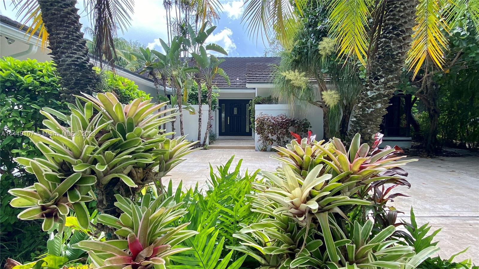 Rarely available in the exclusive and gated Pinecrest enclave of Arabesque, updated and well maintained with vaulted ceilings, close to A rated schools, open and split floor plan, designer kitchen, private and screened-in pool with lush landscaping, wood floors in bedrooms and travertine tile throughout, jet tub, indoor laundry, and lots of closets.  Brand new roof.