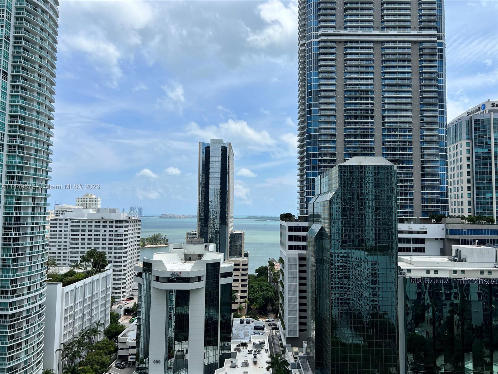 This stunning 2-bedroom, 3-bathroom unit in the heart of Brickell offers a spacious foyer, an expansive dining room, and a comfortable living room. It features high-end furnishings and is located within the exceptional 1010 Brickell building, known for its top-notch amenities including a spa, covered pool, squash courts, a kids' room, rooftop pool, and much more. SAME PRICE WITH FURNITURE.