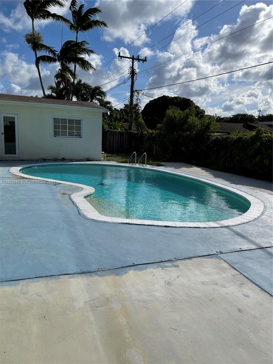 NO HOA! located at great family oriented neighborhood cutler bay! Swimming pool, new hurricane panels, brand new kitchen updated with new appliances and white quartz countertops, fresh paint. 4 years old air conditioning, huge 11,000 SqFt of land for extra RV or car, and more.  2 in-law: one is 1/1 and another is 2/1 for extra rental income. BUYER MUST WAIVE BANK APPRAISAL.