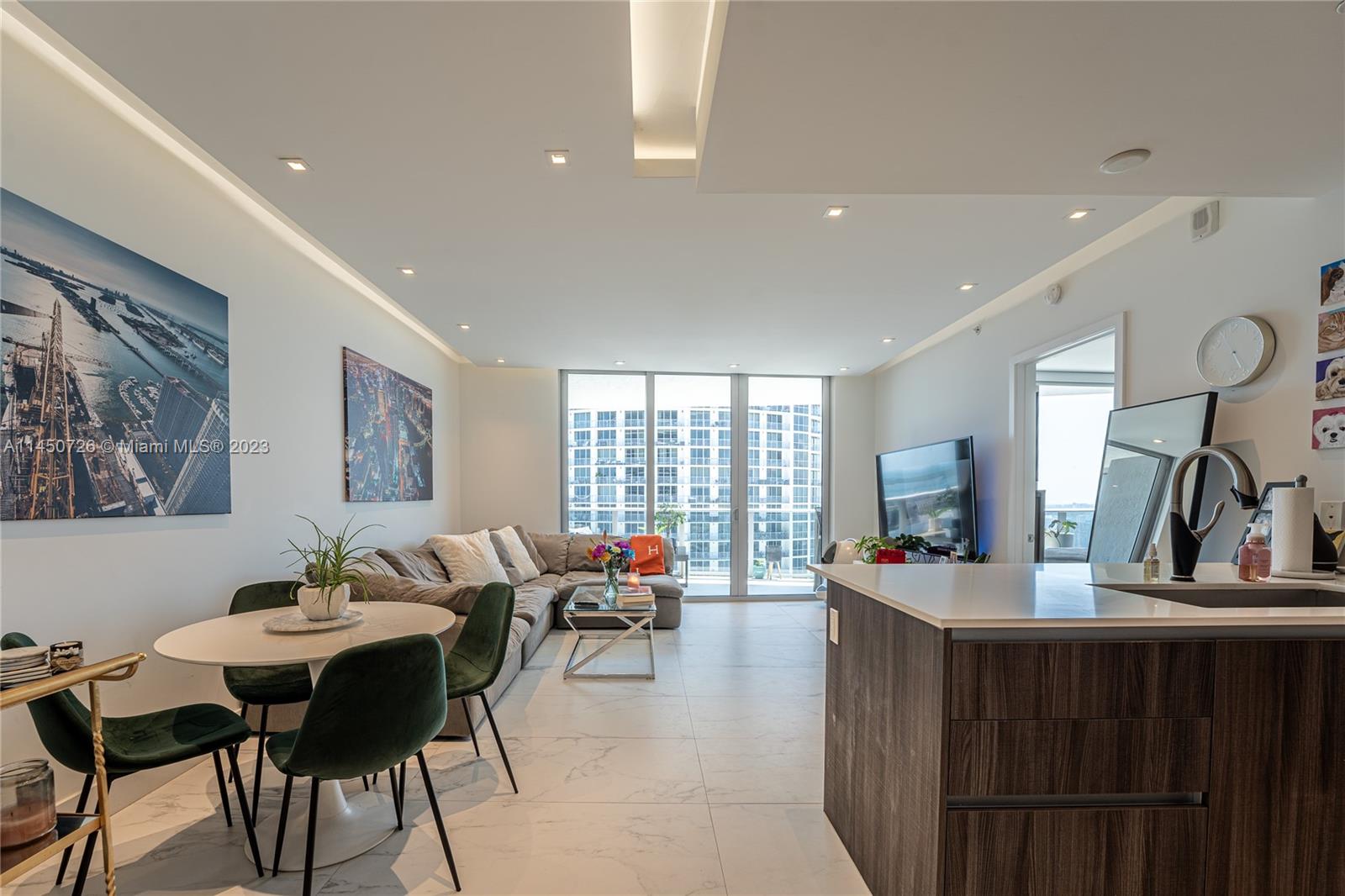 Centrally located in the Arts and Entertainment District with waterfront views and finished with luxurious details at the coveted Aria on the Bay, we proudly bring you unit 4304. This spacious one bed, 1.5 bath condo boasts desirability on all fronts from a central location with close proximity to highways, various neighborhoods in the City of Miami, picturesque ocean and bay front views, shopping and dining all while maintaining a calm and quiet community feel. Interior features of this unit include: Ambient lighting from the custom drop ceiling, powered blinds, matching tile floors throughout the unit and balcony, upgraded shower and tub, quartz countertops, Bosch stainless appliances and a southern facing view of Biscayne Bay and Downtown Miami. Come and see all this unit offers today!