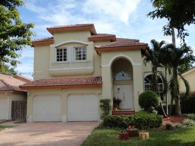 Gorgeous home with 4 bedrooms and 3 complete bathrooms. Garage has an addition of a 5th bedroom. Property is tiled throughout. Spacious floor plan with ground floor room with full bath, Kitchen granite countertop totally upgraded. Enjoy Doral Isles's exclusive restaurant Negroni, gym, spa, pools, sports center with 5 tennis courts, soccer field, 2 Basketball courts, and baseball field. Live the resort lifestyle. 

Bring your best clients to see this amazing house. Won't last!