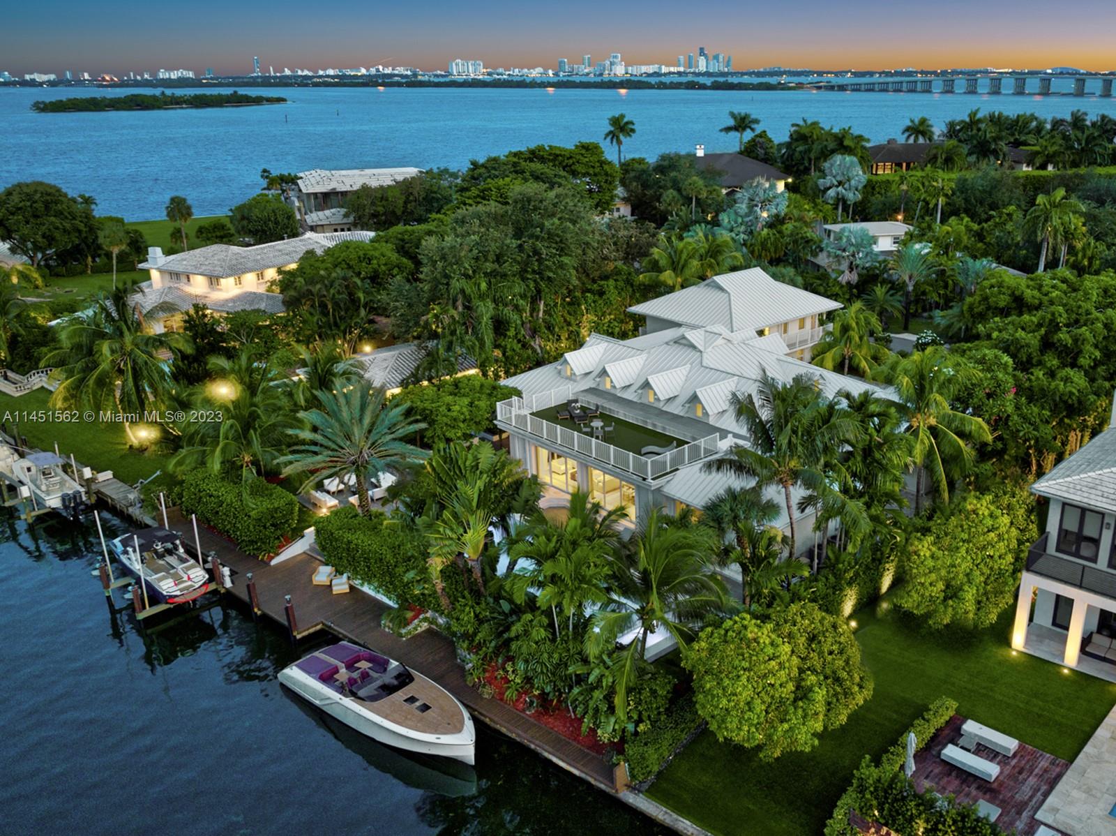 Welcome to Casa Aqua! This boater’s dream modern-Island waterfront residence boasts 120 ft of water frontage with a spacious dock and a lift to fit 2 boats. Sitting on an oversized 20,124 sf lot in the exclusive Island of Miami's truly private gated community of Bay Point, this one story residence with high end finishes throughout, features a sought-after light-filled open floor plan, vaulted ceilings, 7 bedrooms, 6.5 bathrooms, gourmet kitchen with top-of-the-line appliances, private family room, and a bonus room. The spacious Master Suite features 2 walking closets, morning bar, and master bathroom in Carrara marble. Exteriors are ideal to entertain: lushly landscaped backyard with oversize pool, jacuzzi, sunken bar, and rooftop terrace. 2-car garage & generator, and private motor court.