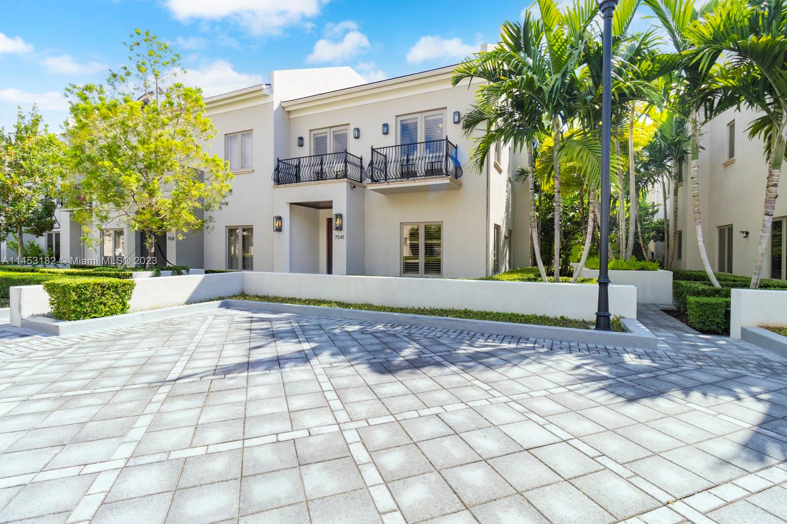 Most Desirable "A" Line - Oak Lane South Miami Luxury Residence! Located steps away from all the restaurants and shops South Miami has to offer. This town-home boasts 3 bedrooms, 4 bath, PLUS a huge office den/entertainment room, 4-6 underground parking spaces, marble & wood floors throughout, top of the line appliances, impact windows, plantation shutters, high ceilings throughout, all closet professionally designed, private terrace, fully finish basement, and plenty of storage. The Oak Lane community is a gated community, perfect for a family that lives an active lifestyle or looking to relieve some of the stresses of owning a traditional home.