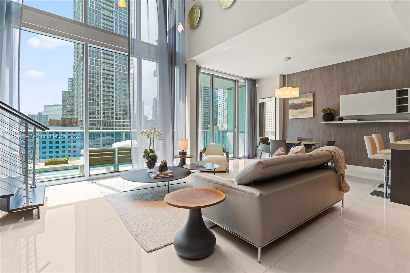 Experience the pinnacle of luxury living with the best panoramic views of Brickell Avenue, the Miami River, and Biscayne Bay. This impeccably designed 2-bedroom, 2.5-bathroom unit with a loft den exudes magazine-worthy style and elegance.

Step into this modern furnished unit with stunning wallpaper accents and be transported to a world of sophistication and comfort. Immerse yourself in the Epic lifestyle, enjoying exclusive access to a range of amenities, including multiple pools, a state-of-the-art fitness center, and world-class dining at renowned restaurants like Zuma.

Don't miss your chance to call this stunning residence home, where every day is a celebration of the Miami lifestyle at its finest.