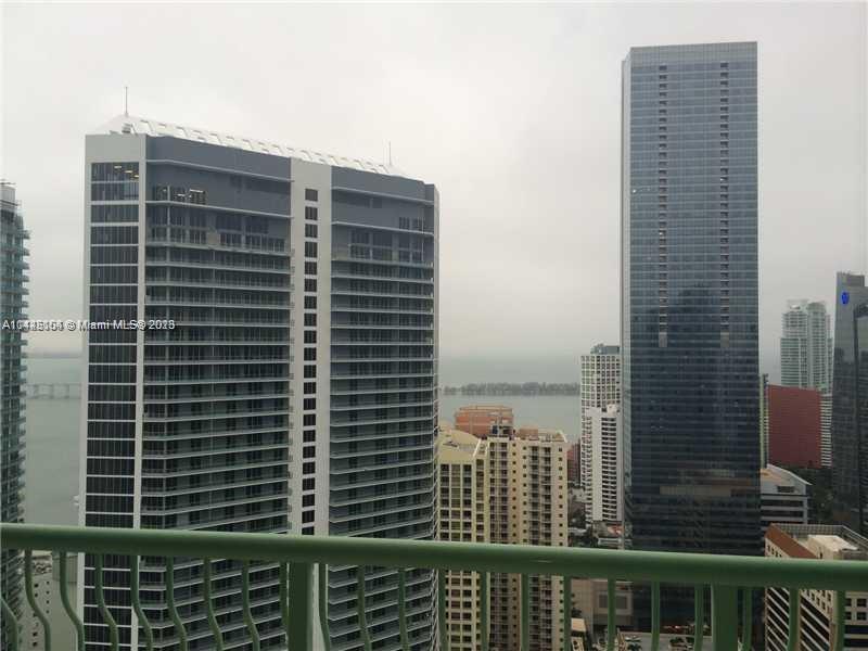 Amazing PH 2 bedroom apartment on the 43th Floor, Breathtaking city and partial water views from this 2/2 spacious condo, Porcelain through the whole apartment and on the balcony too, huge master bedroom has ample walking closet space. Unit features washer and dryer and fully equipped kitchen. The apartment has one large balcony almost 200 s/f come enjoy the colorful south Florida skivvied from the 43th floor. The building has many great amenities: 1 assigned parking, two pools, jacuzzi, fully equipped gym, lounge room children playroom and valet parking.  Close to Brickell City Centre, supermarkets, restaurants and stores. Located in the heart of Brickell Downtown Miami.  Easy to show