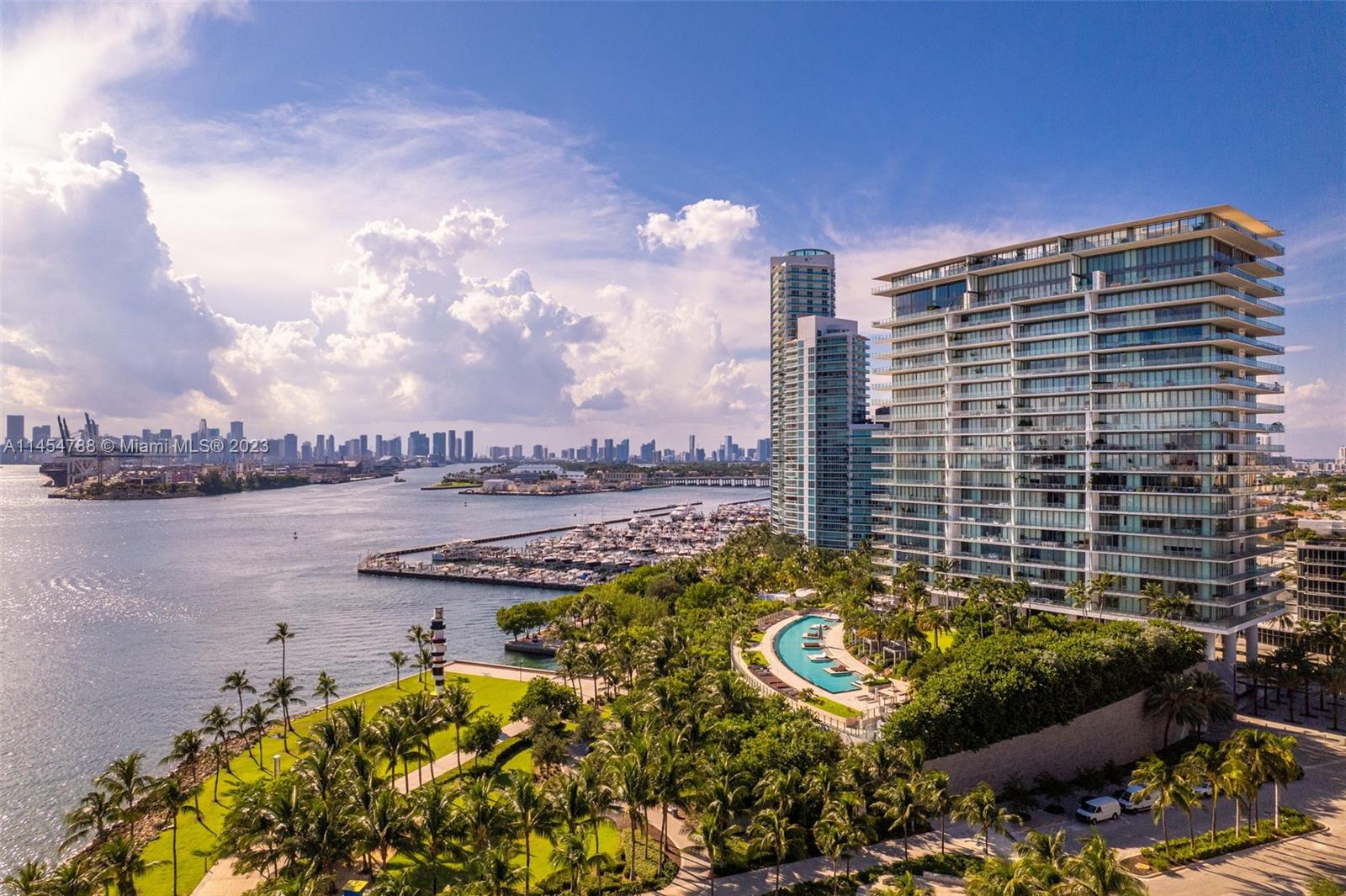 Sought after 4 bedroom at Apogee in prime South of Fifth.  Spacious,  4/3.5 bath corner residence has 4154 sf of indoor living area. Exceptional sunrise and sunset views of Fisher Island, cruise ship alley, and the Ocean are best enjoyed from your 2400 square foot wrap-around terrace with summer kitchen.  Private 2.5 car air-conditioned garage.