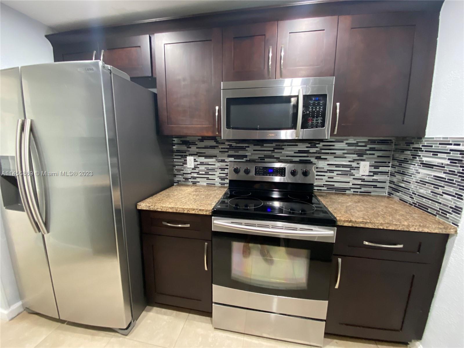 Bright and Spacious remodeled condo, 2 bedrooms, 2 bathrooms, 2 covered parking spaces (42 & 43). Move in ready! Stainless Steel Appliances, Granite Countertop, Washer and Dryer inside unit, Ample Bedrooms with Spacious Walk-In Closet. Balcony off living area. Freshly Painted. Water and Garbage Removal is included in the monthly rent. Easy to Show!!! Call me or Text me Today!!!