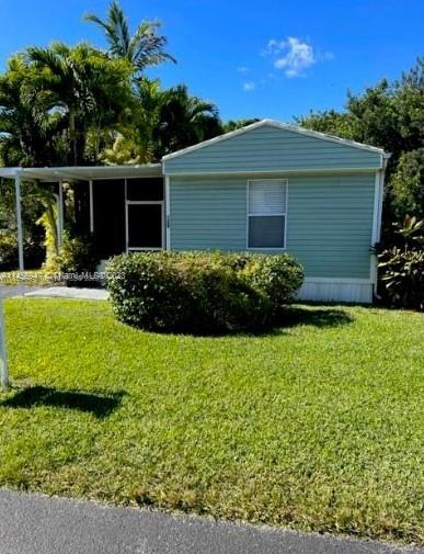 PROPERTY LOCATED IN THE DEEP SW END OF THE COMMUNITY, VERY QUIET NEIGHBORHOOD WITH 2 BEDROOMS AND TWO BATHROOMS, SPLIT PLAN, LARGE MASTER BEDROOM WITH WALK IN CLOSET/ LARGE BATHROOM. NEW AIR CONDITIONER, TANKLESS WATER HEATER, CARPET/LINOLEUM FLOORING, PRIVATE PORCH, BEAUTIFUL COMMUNITY POOL AND LOW MAINTENANCE. PROPERTY IS A SINGLEWIDE MANUFACTURED HOME. PROPERTY IS IS EASY TO MAINTAIN. MOTIVATED SELLER, SELLER OFFERING UP TO $5,000 CLOSING CREDIT TOWARDS BUYERS CLOSING/PREPAID COST. Save on closing cost with this Great Opportunity Given !