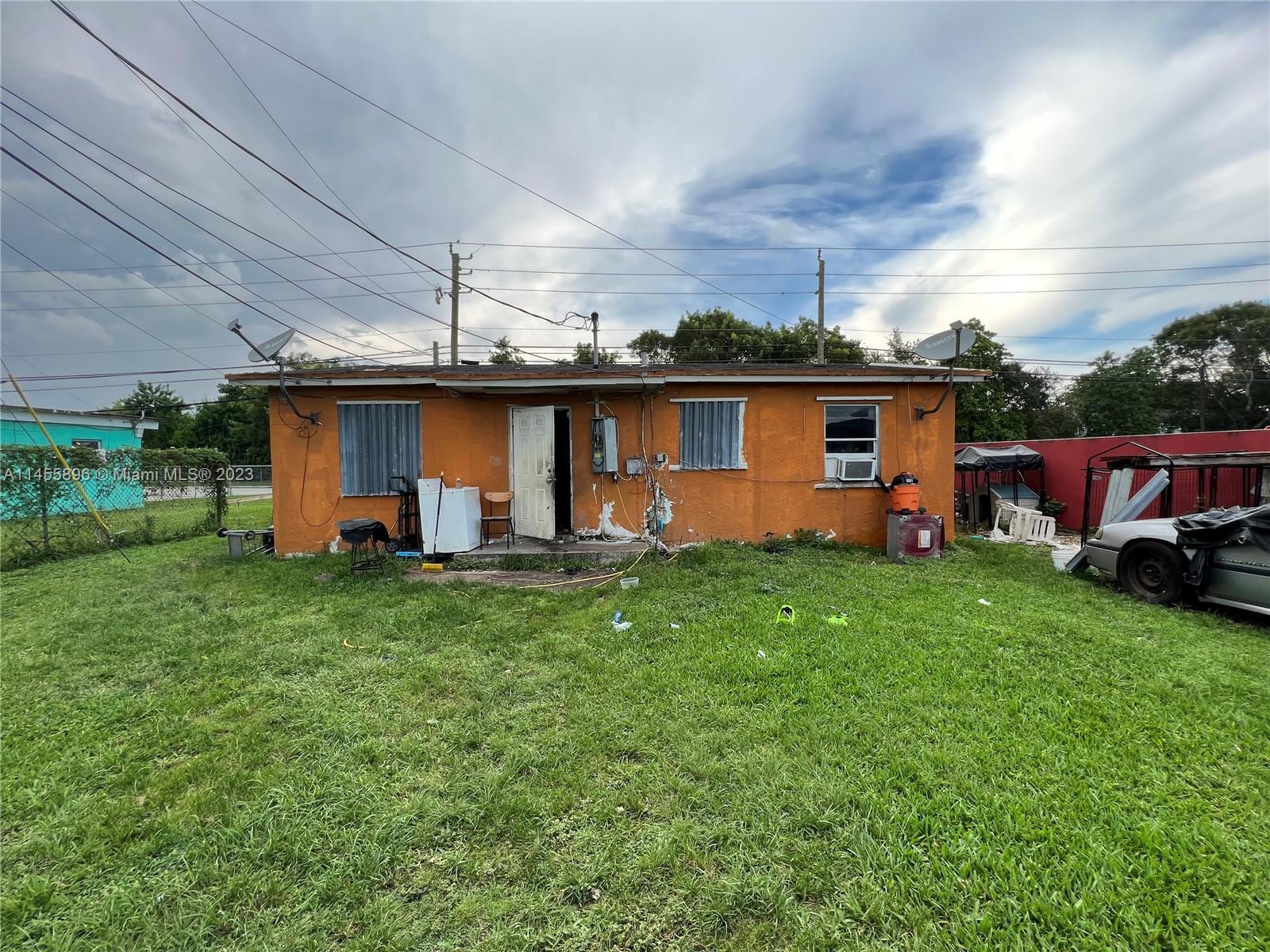 Are you looking for the perfect investment opportunity in the heart of Florida City? Look no further! This unique property offers an incredible chance to maximize your real estate portfolio's potential. With a spacious lot, zoning for multiplex development up to 10 units, and a prime location near shops, parks, and restaurants, this is a must-see opportunity for savvy investors. This property features a cozy 2-bedroom, 1-bathroom single-family home with an additional bonus bedroom. While it needs some TLC and updates, it presents a fantastic opportunity to design and renovate according to your vision. The spacious layout offers endless possibilities for customization, making it an ideal project for investors looking to maximize their ROI.