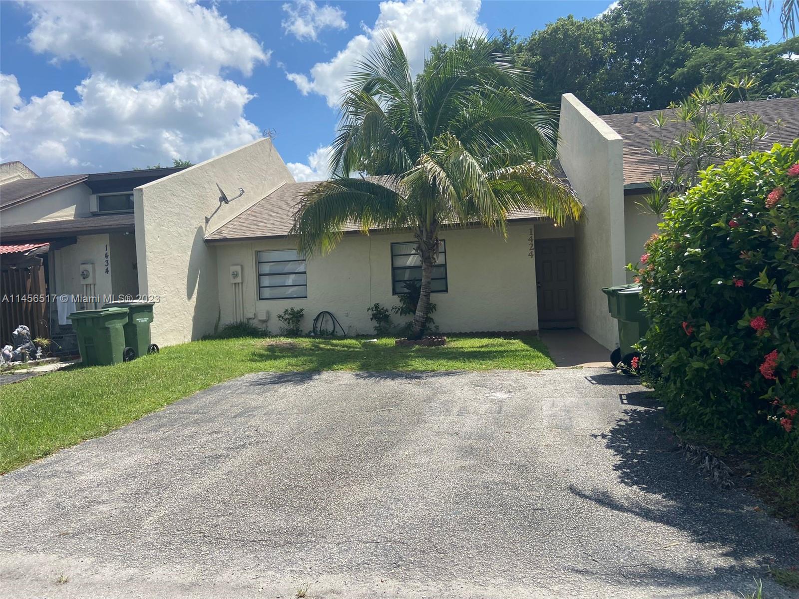 Unfurnished one story town home located in highly sought after Villages of Homestead. Ready to move in with new roof, AC, and painted inside and out less than a year ago. Primary bedroom has a walk in closet. Must see to appreciate this cozy quiet neighborhood. Located very close to the Turnpike. The backyard is fully fenced. Conveniently located next to major retail destinations, restaurants, Homestead Baptist Hospital, US1 & FL turnpike. Just a hop away from the famous Florida Keys. Pets are welcome :) Must have great credit. REALTORS: PLEASE USE SHOWING TIME, WATER IS NOT INCLUDED.