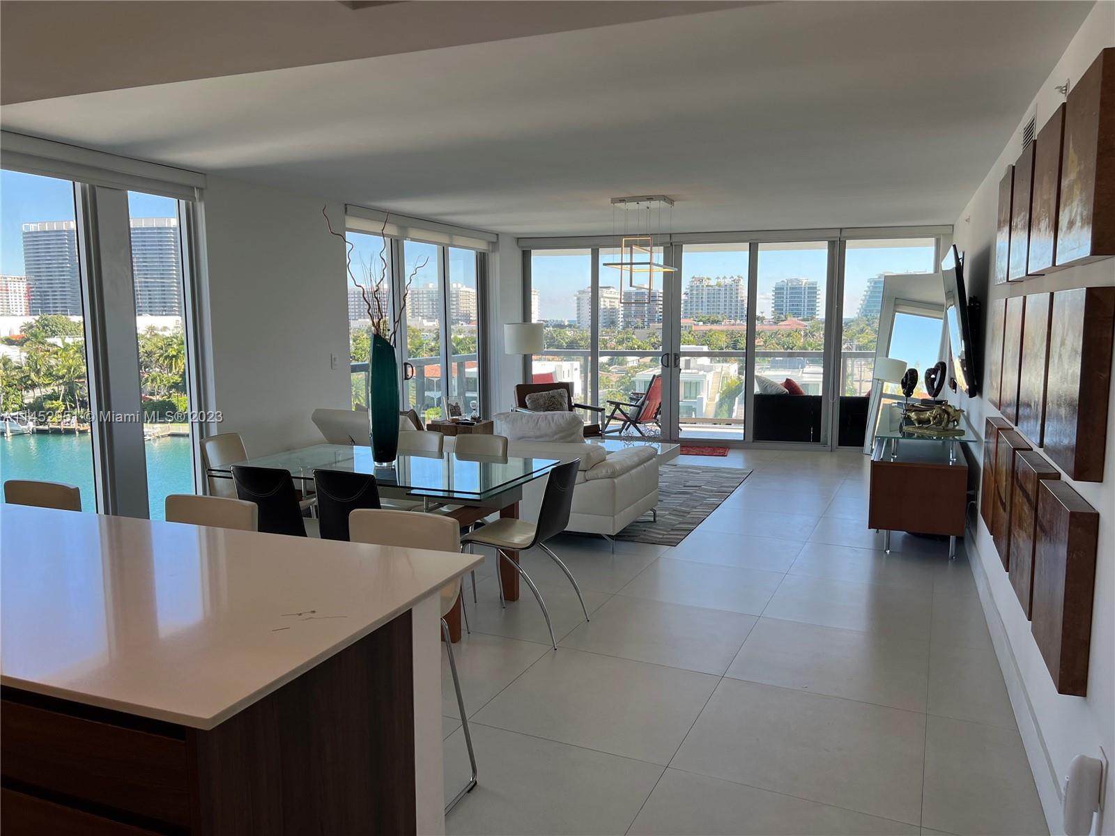 A most lovely corner unit, full of light, so spacious . Many windows make the water colors of the direct water view , a perfect setting .  Rooms are spacious , den can easily be made into a 3rd bedroom and there are 3 full baths.  A pleasure to show . Boutique , new cosntruction , awesome rooftop pool. Short term allowed.
