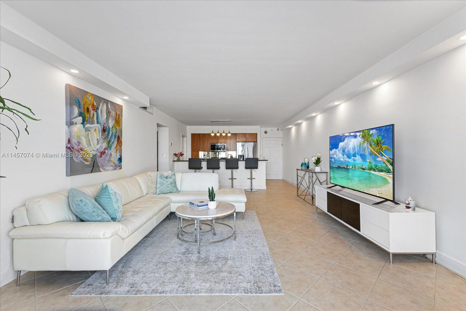 Welcome To Island Pointe Located On The Northern Tip Of Bay Harbor Islands. This Impeccable 1 Bed 
1 Bath Plus Den Features Direct Water Views Every Room, New Appliances, Ceramic Floors, Updated Bathroom, New Washer/ Dryer, New Skim Coated Walls & Paint, 2 Walk-In Closets, New Shades.  Easy Access The Pool, Bay, Tiki Bar, Dock, BBQ & Fitness/Media/ Party Room From Your Balcony.  1 Parking Space & Large Storage Unit. Maintenance Includes AC, Cable, WiFi, 24 Hour Front Desk, Secured Building.  Gated Community Within Walking Distance To Beaches, Shops, Restaurants, A-Rated RKB K-8 School, Parks, Bal Harbour Shops. A Must See!