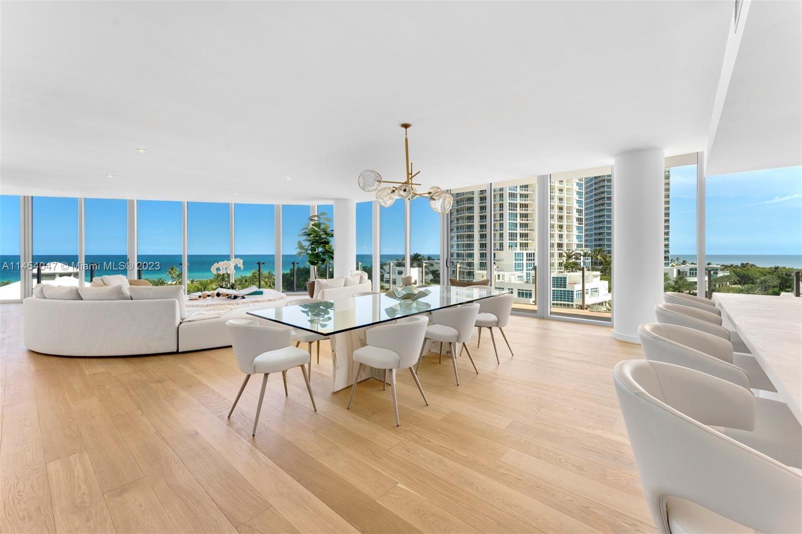 Embrace modern luxury living in this Penthouse with private rooftop at the heart of South-of-Fifth at One Ocean, where a waterfront lifestyle meets the vibrancy of the city. Blending form & function, this 3,339 sq. ft. penthouse is nestled in a prime location with unobstructed ocean views, showcasing South Beach’s coastal charm. This open-concept residence boasts its own rooftop oasis with sunrise to sunset views, wraparound balcony, floor-to-ceiling windows, & private elevator entrance, setting the stage for a lifestyle of comfort & entertainment. Exquisitely finished, the kitchen exhibits marble countertops, wooden cabinetry, Wolf appliances & wine cooler. Enjoy resort-style amenities steps away from the famous fine dining & shopping of South Beach.