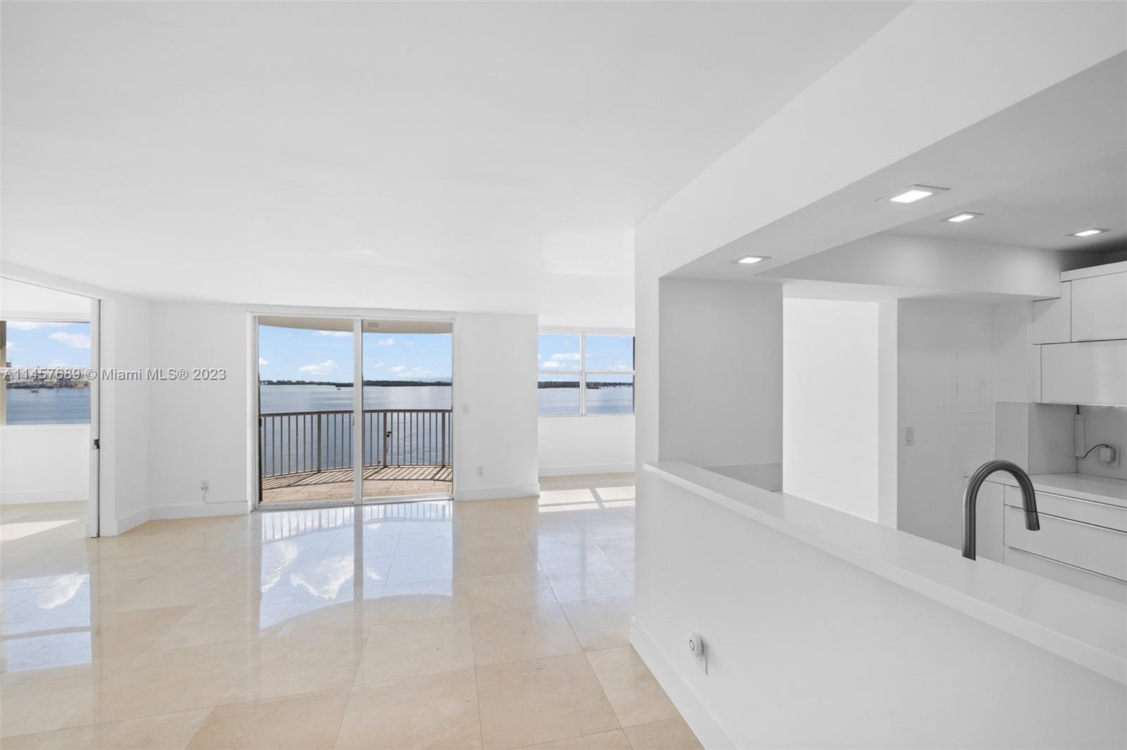Captivating 3BR/2BA Corner Unit with Mesmerizing Biscayne Bay Views, gracing the 10th floor with awe-inspiring, unobstructed 180° vistas of the enchanting Biscayne Bay.
Luxury reigns supreme with meticulous upgrades, where elegant marvel floors grace your footsteps, and a thoroughly modernized kitchen showcases brand-new appliances.
An opulent master suite awaits, offering dual sinks, roomy walk-in closets, and an indulgent en-suite bathroom. Two additional bedrooms and another full bathroom complete this thoughtfully designed layout.

Of particular note, this unit boasts the prized inclusion of not one, but two assigned parking spaces, a truly rare find in this highly sought-after locale.